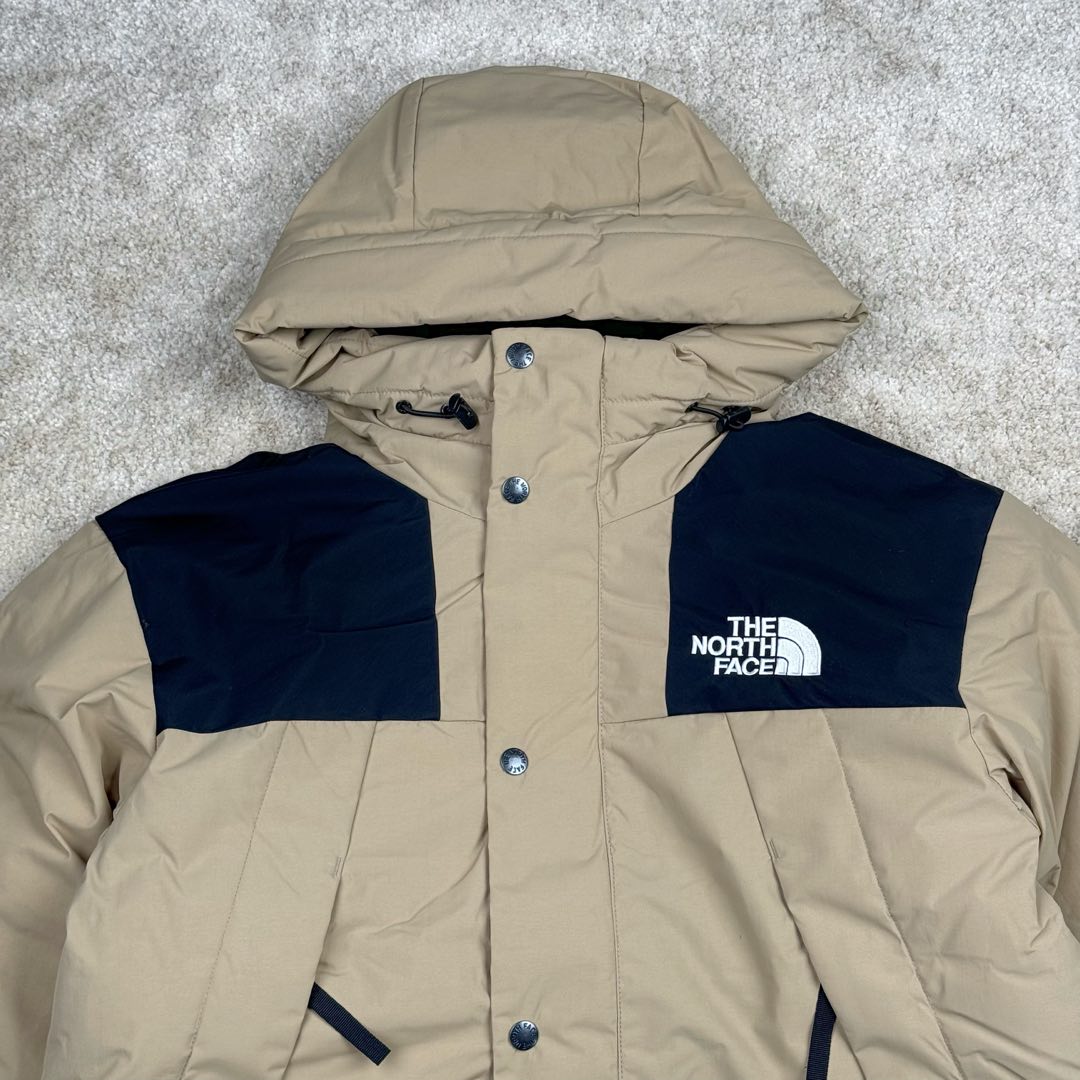 图片[4]-THE NORTH FACE Mountain FW24 Gore-Tex dryvent ULTIMATE 北面山脉系列防水面料刺绣LOGO防风保暖鹅绒连帽含羽绒外套男女同款 The North Face于1966年成立，一直致力于为户外运动员的每一次严酷探索提供专业装备。作为全球户外运动领导品牌，The NorthFace以经过专业运动员测试、适应各类户外需求的产品助力探索者不断超越自我，激发人类潜能。The North Face象征着众多山脉中更冷、更值得挑战的北坡。品牌标志则来自Half Dome，一座位于美国加州Yosemite NationalPark（优胜美地国家公园）里的山峰，中文名字取为「北面」，象征着不畏惧的户外探索精神。1997年，The North Face采用全新的宣传标语「Never Stop Exploring探索永不停止」，体现品牌的探索精神，成为品牌的座右铭。尺码：XS S M L XL 2XL-选品中心