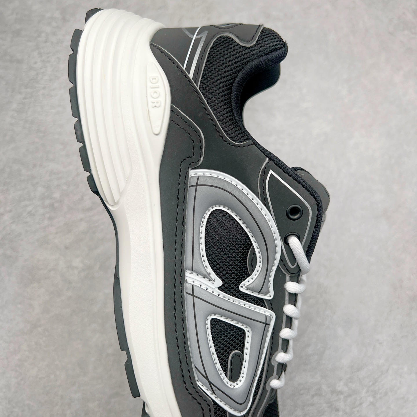 图片[6]-＃ZC总裁 Dior B30 迪奥网眼织物低帮运动休闲鞋 原版开模 海淘专供品质同渠道货源 全套专柜原装配件 该款系列采用黑网色眼织物白和色科技料面精心制 作饰以反光“CD30”图形标志 外格轻盈的刻雕效果橡胶鞋搭底配标志性点的缀提升格调 内弹部力细节塑造想理的舒适穿着体验可与各休式闲造型配搭 彰显尚时现代的运风动范 正常尺码：39 40 41 42 43 44 45-选品中心