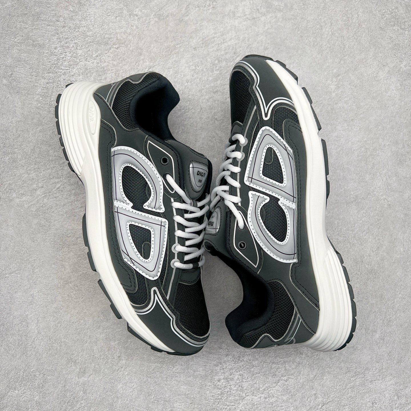 图片[3]-＃ZC总裁 Dior B30 迪奥网眼织物低帮运动休闲鞋 原版开模 海淘专供品质同渠道货源 全套专柜原装配件 该款系列采用黑网色眼织物白和色科技料面精心制 作饰以反光“CD30”图形标志 外格轻盈的刻雕效果橡胶鞋搭底配标志性点的缀提升格调 内弹部力细节塑造想理的舒适穿着体验可与各休式闲造型配搭 彰显尚时现代的运风动范 正常尺码：39 40 41 42 43 44 45-选品中心