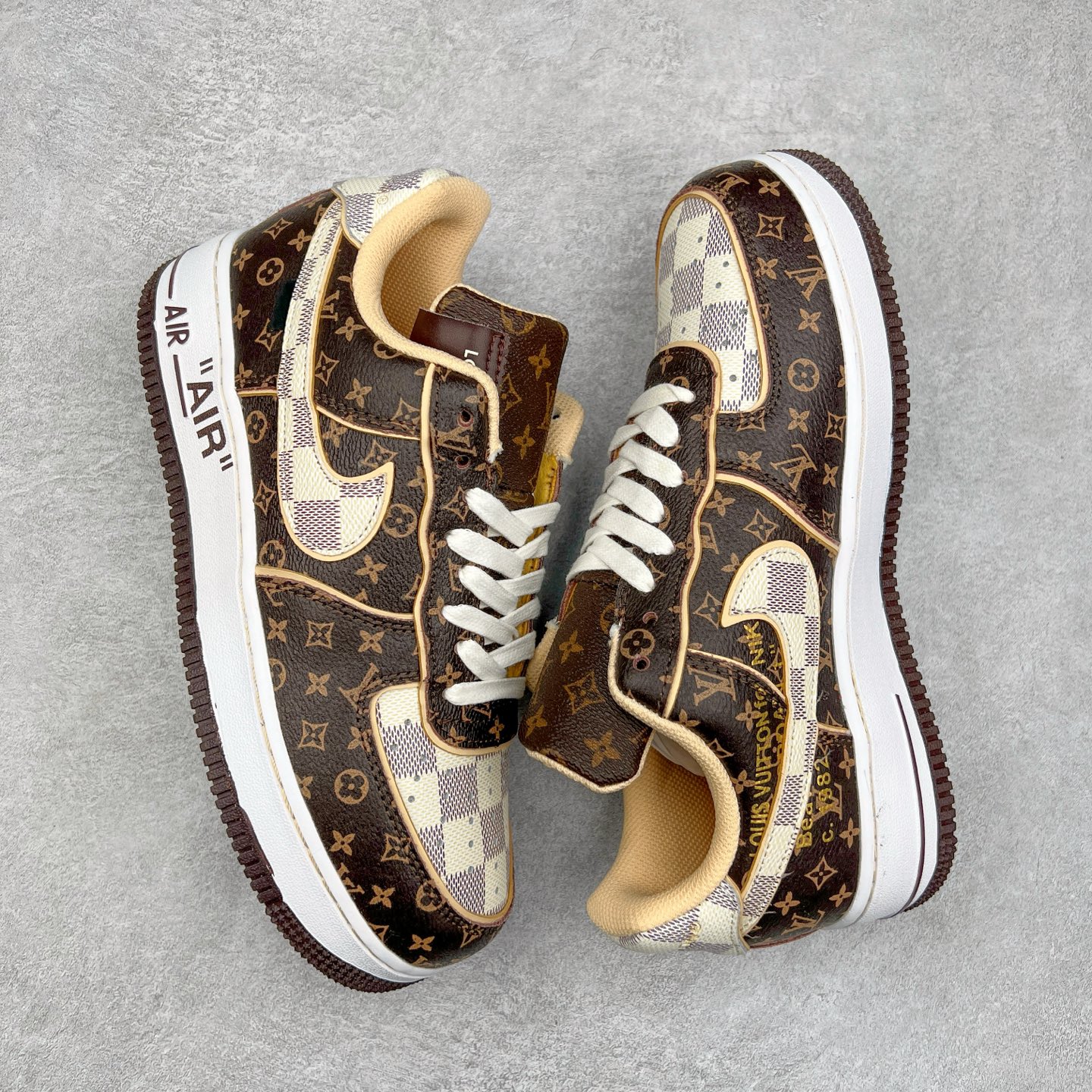 图片[3]-＃福利特价 Louis Vuitton x NK Air Force 1 联名款 空军一号低帮休闲运动板鞋 毫无疑问 今年的鞋王非 LV x Air Force1 莫属 LV 的强强联名 再加上是 Virgil Abloh 联名鞋款的绝唱系列 让鞋头们又多了一个不得不买的理由 苏富比在官方 ins 账号上发布了 LV x Nike Air Force 1 第一波发售信息，会以线上拍卖的形式在苏富比网站上进行发售 限量200双 尺码从 US5到 US18 每双鞋的起拍价为2,000美元 预估价在5,000-15,000美元 拍卖所得收益将全数捐赠给 Virgil Abloh 创立的「Post-Modern」奖学金基金 拍卖时间从1月26日进行到2月8日 发售的第一双是最具代表性的小牛皮 LV 老花款式 它集合了 LV 与 Virgil 最经典的设计 鞋身拼接了 LV 两大经典 monogram 印花和 damier 棋盘格元素 侧面、鞋带上的“AIR”“LACET”字样是 Virgil 的招牌设计 白色中底搭配 LV 经典棕色 尽显奢华魅力 此次拍卖还会附带特别版皮质鞋盒 通体一身的橘色鞋盒印满了 LV monogram 老花 顶部搭配了白色锁扣以及 Swoosh 吊饰 日常还可以当作旅行箱使用 尺码：36 36.5 37.5 38 38.5 39 40 40.5 41 42 42.5 43 44 44.5 45-选品中心