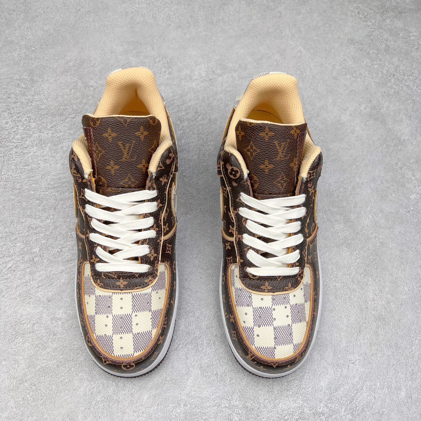 图片[2]-＃福利特价 Louis Vuitton x NK Air Force 1 联名款 空军一号低帮休闲运动板鞋 毫无疑问 今年的鞋王非 LV x Air Force1 莫属 LV 的强强联名 再加上是 Virgil Abloh 联名鞋款的绝唱系列 让鞋头们又多了一个不得不买的理由 苏富比在官方 ins 账号上发布了 LV x Nike Air Force 1 第一波发售信息，会以线上拍卖的形式在苏富比网站上进行发售 限量200双 尺码从 US5到 US18 每双鞋的起拍价为2,000美元 预估价在5,000-15,000美元 拍卖所得收益将全数捐赠给 Virgil Abloh 创立的「Post-Modern」奖学金基金 拍卖时间从1月26日进行到2月8日 发售的第一双是最具代表性的小牛皮 LV 老花款式 它集合了 LV 与 Virgil 最经典的设计 鞋身拼接了 LV 两大经典 monogram 印花和 damier 棋盘格元素 侧面、鞋带上的“AIR”“LACET”字样是 Virgil 的招牌设计 白色中底搭配 LV 经典棕色 尽显奢华魅力 此次拍卖还会附带特别版皮质鞋盒 通体一身的橘色鞋盒印满了 LV monogram 老花 顶部搭配了白色锁扣以及 Swoosh 吊饰 日常还可以当作旅行箱使用 尺码：36 36.5 37.5 38 38.5 39 40 40.5 41 42 42.5 43 44 44.5 45-选品中心