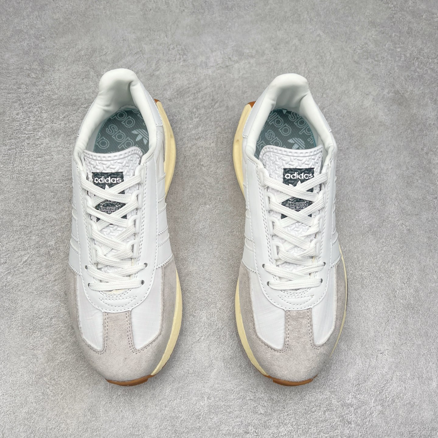 图片[2]-AD Originals Retropy Boost E5系列复古赛车原型一代系列爆米花缓震休闲运动慢跑鞋 复古风格鞋款作为如今的流行趋势之一深受欢迎，正是因此，将品牌历史经典设计与现代材料和技术相融合成为了Originals的创作思路，重新带来那些经典作品并赋予新诠释，使其跨越历史，成为时代标签。通过重新组合品牌历史经典与当代创新技术 Originals推出Retropy E5新鞋款 在延续复古韵味的同时，设计上做出更适应于现代化审美的调整。鞋面采用尼龙材质和绒面革结合打造，搭配BOOST材质中底提供舒适的日常穿着体验。尺码：36 36⅔ 37⅓ 38 38⅔ 39⅓ 40 40⅔ 41⅓ 42 42⅔ 43⅓ 44 45-选品中心