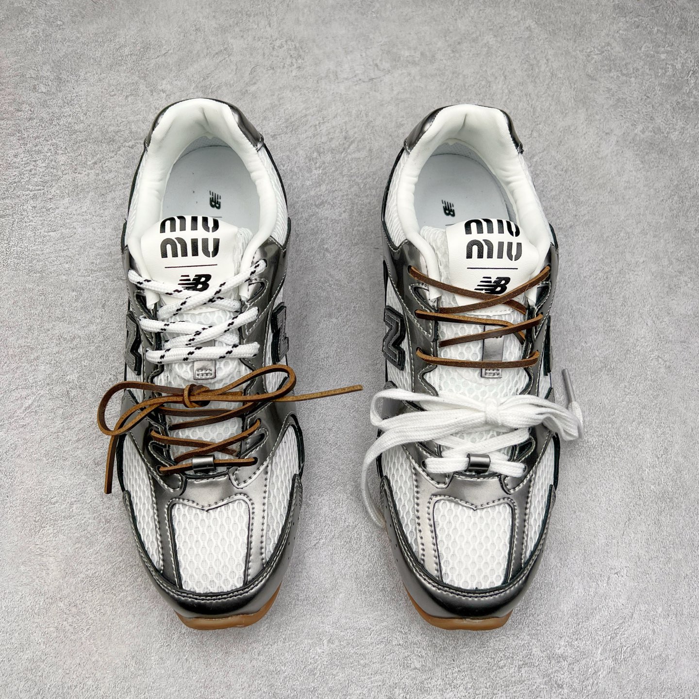 图片[2]-＃M3 MiuMiu x New Balance NB530 SL 缪缪联名系列低帮经典复古休闲运动慢跑鞋 近几年运动品牌与各大潮流品牌不断推出联名产品，在球鞋圈拥有极高的热度。此外，奢侈品牌和运动品牌联名也早已非新鲜事，继 Dior 和 Jordan Brand 以及 Prada 和 adidas 合作后。近日，Miu Miu与New Balance的合作基本已经成为定番，每年都会上新，而近期的最新联名也已经正式曝光，预计会在24年春夏面世！相比之前两次使用的574，这次Miu Miu带来了全新风格。采用了全新型号MR530进行设计，继续使用复古的旧化效果和去年就被带火的美拉德配色打造。Miu Miu作为千禧文化的重要推手，这次也是直接挑选了New Balance 2000年代时发布的健身跑鞋MR530。整体做旧效果非常明显，甚至有些二手鞋的感觉，多少是有点瘦巴黎世家影响了……配色方面将会推出米色和棕色两种颜色可供选择，整体覆盖了做旧麂皮，鞋舌和鞋垫和之前一致，有Miu Miu的Logo，同时搭配皮革和棉质双鞋带组成。尺码：36 37 37.5 38 38.5 39.5 40 40.5 41.5 42 42.5 43.5 44 44.5 45-选品中心