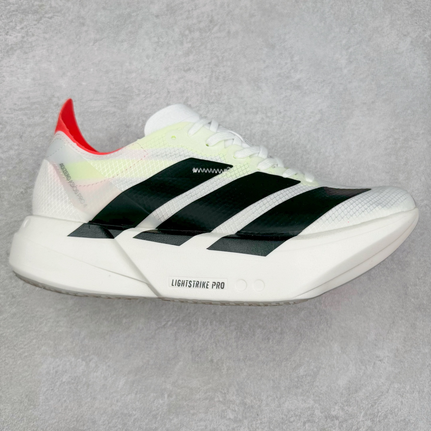 AD Adizero Adios Pro 4 马拉松竞速专业跑鞋 JR1094 CELERMESH针织网面非常轻薄 纤维间的缝隙很大 可以保证跑步时的透气、排汗效果 鞋舌直接与两侧的内衬和鞋底连接在一起 在跑步过程中不会被鞋舌的左右移动所困扰 在标准鞋带孔的基础上再拓宽一组鞋带孔 适合不同脚型的需求 突破性 EnergyRods 技术，有助于跑者实现更好的成绩 中底独特的LIGHTSTRIKE PRO泡棉材质 微弹感觉在跑步过程中给予了良好的支撑体验 对于顶级精英和高水平进阶跑者来说 ADIOS PRO是一双值得信赖的竞速比赛用鞋 尺码：36 36.5 37.5 38 38.5 39 40 40.5 41 42 42.5 43 44 44.5 45-选品中心