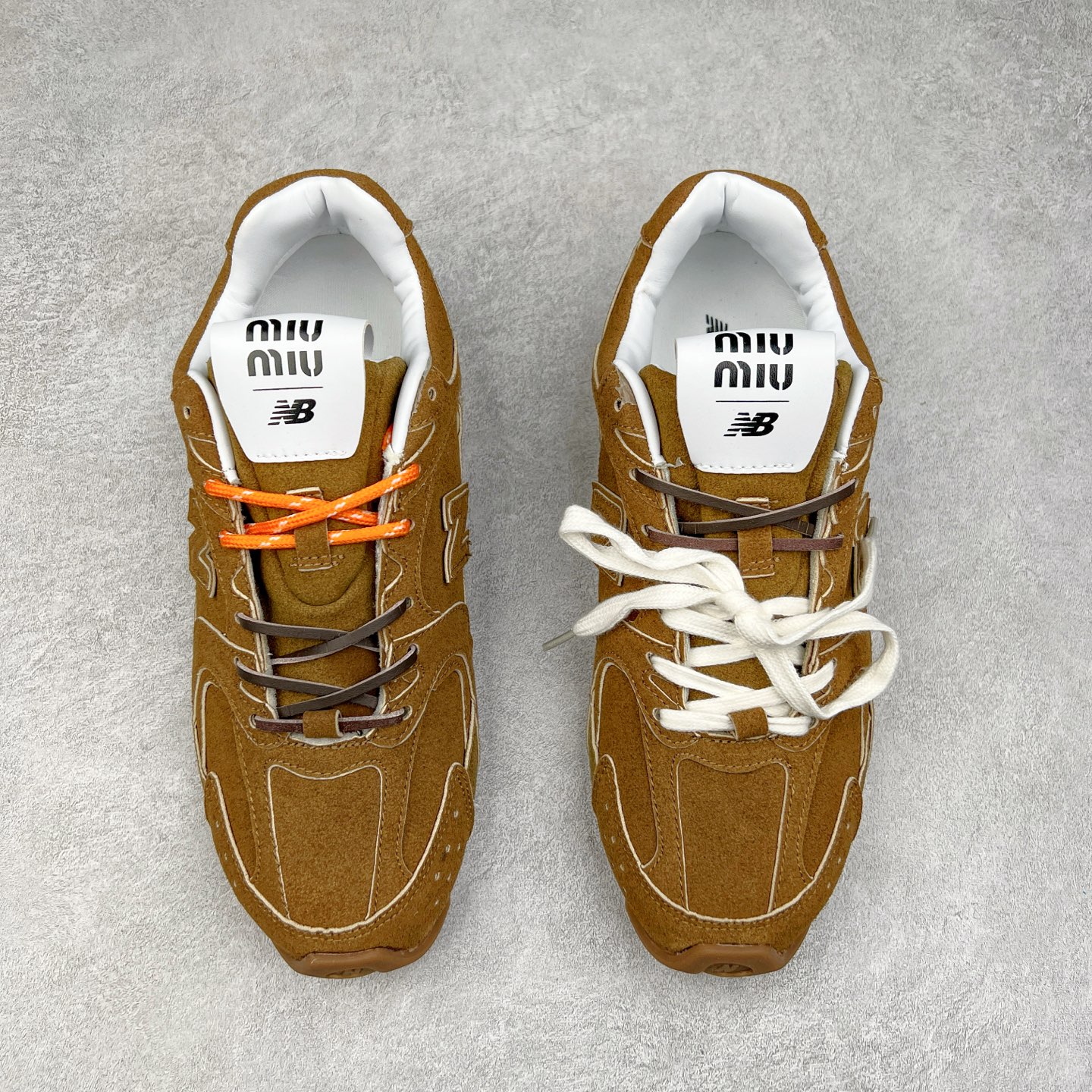 图片[2]-＃M3 MiuMiu x New Balance NB530 SL 缪缪联名系列低帮经典复古休闲运动慢跑鞋 近几年运动品牌与各大潮流品牌不断推出联名产品，在球鞋圈拥有极高的热度。此外，奢侈品牌和运动品牌联名也早已非新鲜事，继 Dior 和 Jordan Brand 以及 Prada 和 adidas 合作后。近日，Miu Miu与New Balance的合作基本已经成为定番，每年都会上新，而近期的最新联名也已经正式曝光，预计会在24年春夏面世！相比之前两次使用的574，这次Miu Miu带来了全新风格。采用了全新型号MR530进行设计，继续使用复古的旧化效果和去年就被带火的美拉德配色打造。Miu Miu作为千禧文化的重要推手，这次也是直接挑选了New Balance 2000年代时发布的健身跑鞋MR530。整体做旧效果非常明显，甚至有些二手鞋的感觉，多少是有点瘦巴黎世家影响了……配色方面将会推出米色和棕色两种颜色可供选择，整体覆盖了做旧麂皮，鞋舌和鞋垫和之前一致，有Miu Miu的Logo，同时搭配皮革和棉质双鞋带组成。尺码：36 37 37.5 38 38.5 39.5 40 40.5 41.5 42 42.5 43.5 44 44.5 45-选品中心