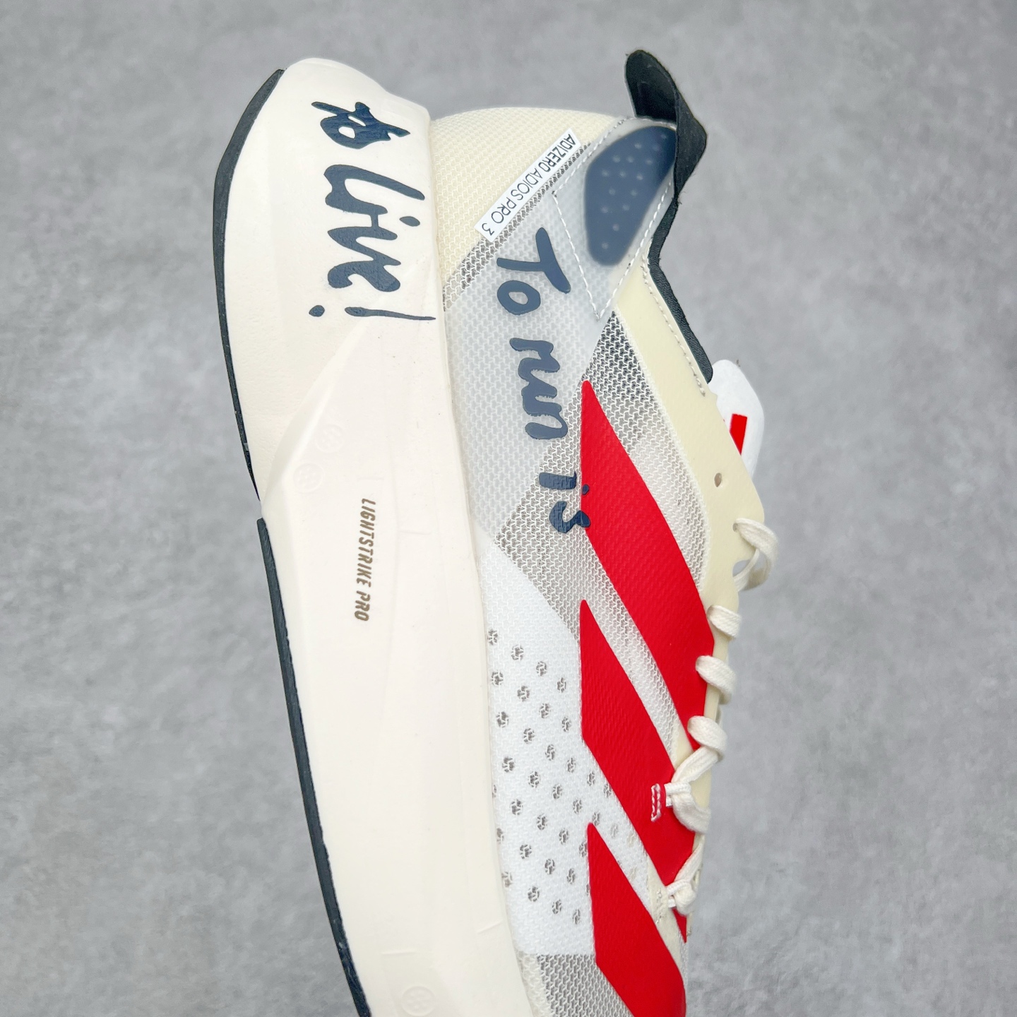 图片[6]-AD Adizero Adios Pro 3 马拉松竞速专业跑鞋 GW7261 CELERMESH针织网面非常轻薄 纤维间的缝隙很大 可以保证跑步时的透气、排汗效果 鞋舌直接与两侧的内衬和鞋底连接在一起 在跑步过程中不会被鞋舌的左右移动所困扰 在标准鞋带孔的基础上再拓宽一组鞋带孔 适合不同脚型的需求 突破性 EnergyRods 技术，有助于跑者实现更好的成绩 中底独特的LIGHTSTRIKE PRO泡棉材质 微弹感觉在跑步过程中给予了良好的支撑体验 对于顶级精英和高水平进阶跑者来说 ADIOS PRO是一双值得信赖的竞速比赛用鞋 尺码：36 36.5 37.5 38 38.5 39 40 40.5 41 42 42.5 43 44 44.5 45-选品中心