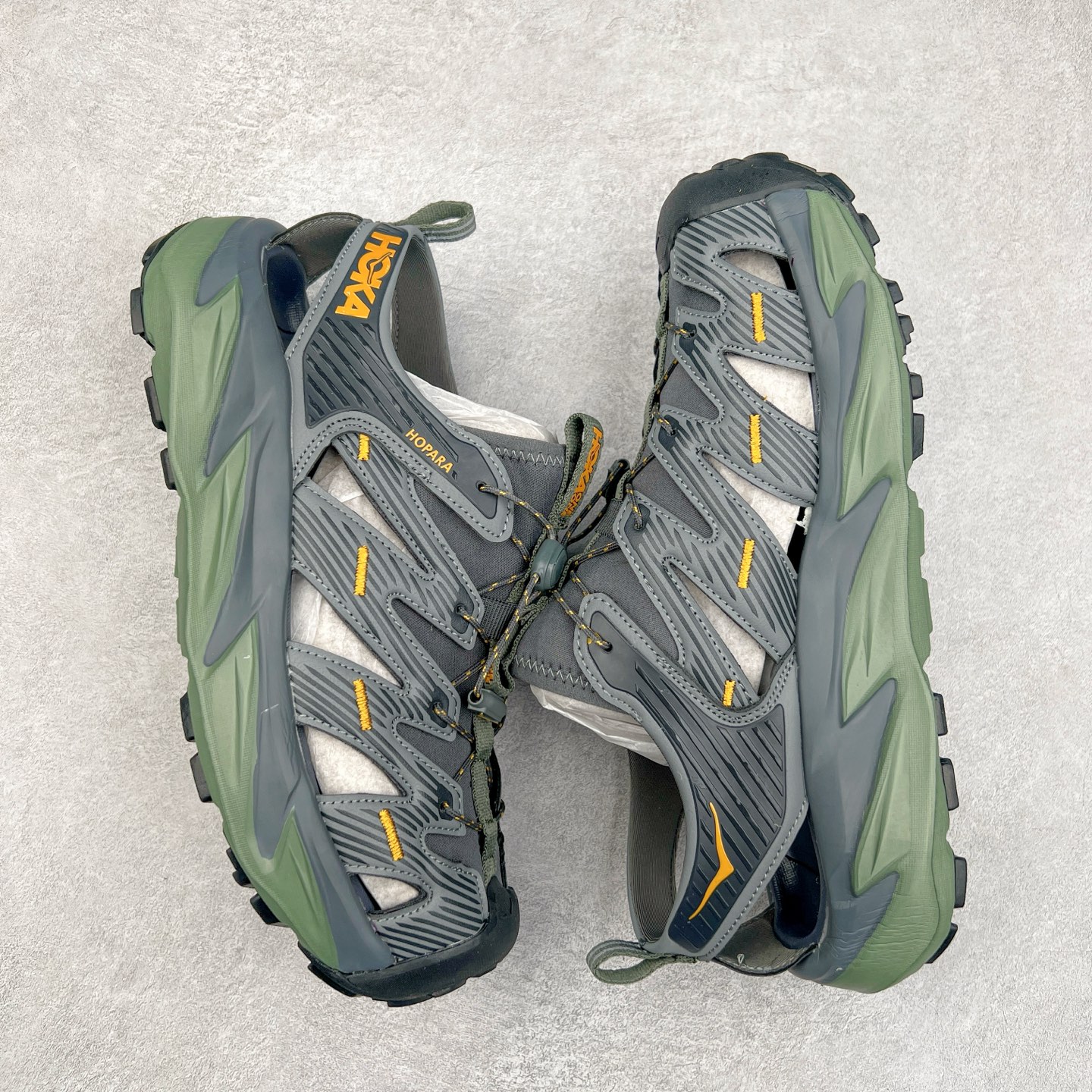 图片[3]-＃HK纯原 HOKA One One Hopara Sandals 霍帕拉系列水路两用溯溪涉水休闲户外露营凉鞋 作为先锋品牌的 HOKA ONE ONE总是以独特的方式 HOPA RA是一款溯溪鞋 又名排水鞋 可长期用于涉水和溯溪 保护脚底和脚趾的安全和舒适 鞋面材料速干 透气 耐磨 鞋底防滑 耐磨 抓地能力强 出于安全考虑 设计要求较高 涉水溯溪过程中 水 泥沙 可以直接从鞋内大孔排出 细纹鞋底使在岩石上抓地能力强 避免打滑 而上路后 鞋面具有快干透气等优点 尺码：36 36.5 37.5 38 39 40 40.5 41 42 42.5 43 44 45-选品中心