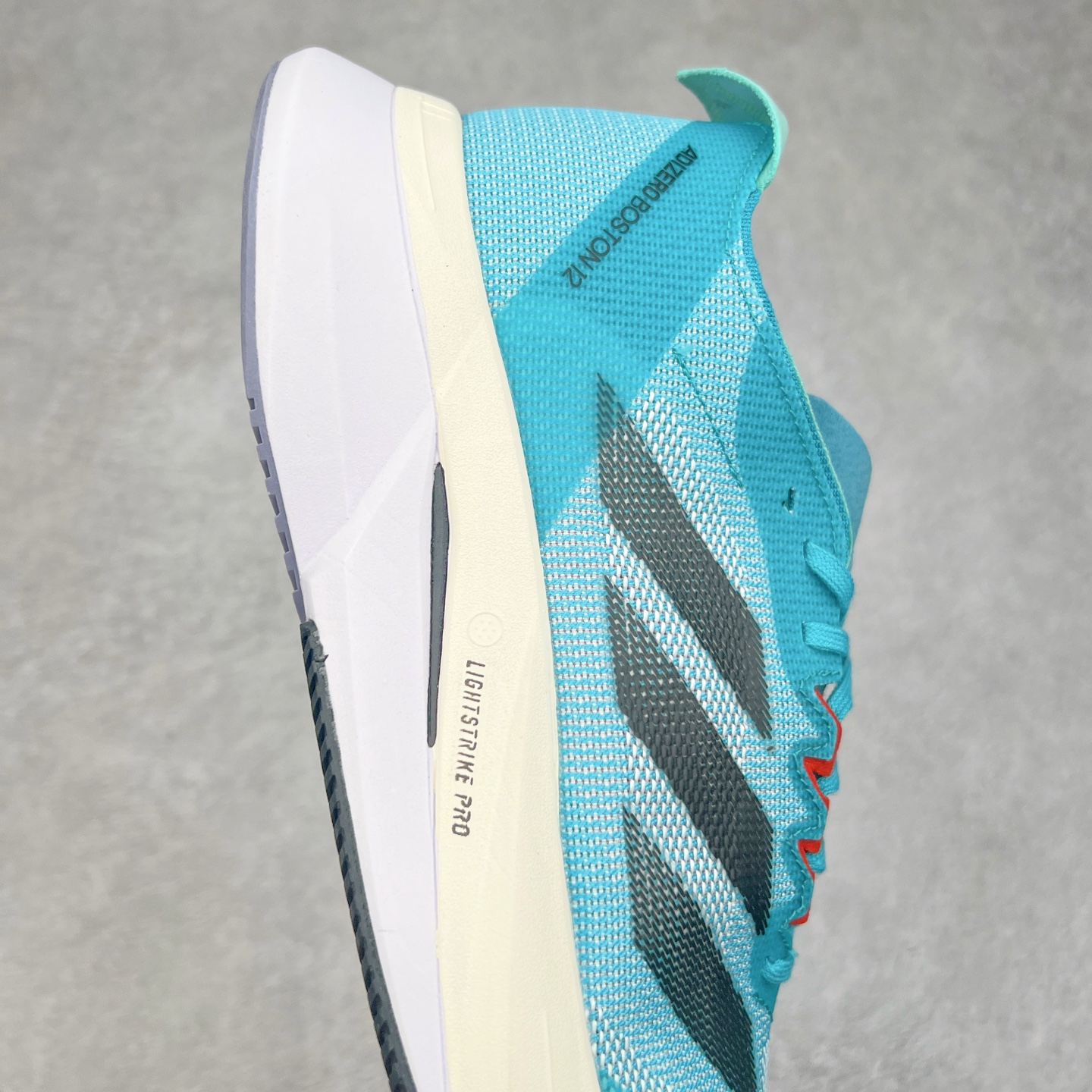 图片[6]-AD Adizero Adios Pro 4 马拉松竞速专业跑鞋 ID4236 CELERMESH针织网面非常轻薄 纤维间的缝隙很大 可以保证跑步时的透气、排汗效果 鞋舌直接与两侧的内衬和鞋底连接在一起 在跑步过程中不会被鞋舌的左右移动所困扰 在标准鞋带孔的基础上再拓宽一组鞋带孔 适合不同脚型的需求 突破性 EnergyRods 技术，有助于跑者实现更好的成绩 中底独特的LIGHTSTRIKE PRO泡棉材质 微弹感觉在跑步过程中给予了良好的支撑体验 对于顶级精英和高水平进阶跑者来说 ADIOS PRO是一双值得信赖的竞速比赛用鞋 尺码：36 36.5 37.5 38 38.5 39 40 40.5 41 42 42.5 43 44 44.5 45-选品中心