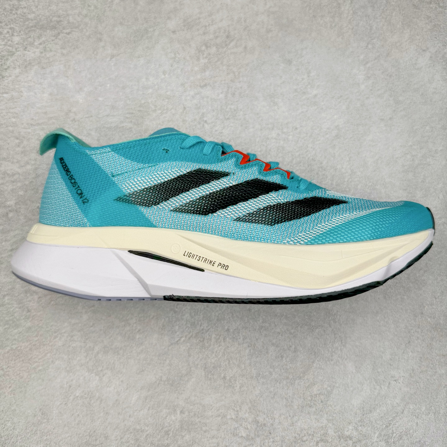 AD Adizero Adios Pro 4 马拉松竞速专业跑鞋 ID4236 CELERMESH针织网面非常轻薄 纤维间的缝隙很大 可以保证跑步时的透气、排汗效果 鞋舌直接与两侧的内衬和鞋底连接在一起 在跑步过程中不会被鞋舌的左右移动所困扰 在标准鞋带孔的基础上再拓宽一组鞋带孔 适合不同脚型的需求 突破性 EnergyRods 技术，有助于跑者实现更好的成绩 中底独特的LIGHTSTRIKE PRO泡棉材质 微弹感觉在跑步过程中给予了良好的支撑体验 对于顶级精英和高水平进阶跑者来说 ADIOS PRO是一双值得信赖的竞速比赛用鞋 尺码：36 36.5 37.5 38 38.5 39 40 40.5 41 42 42.5 43 44 44.5 45-选品中心