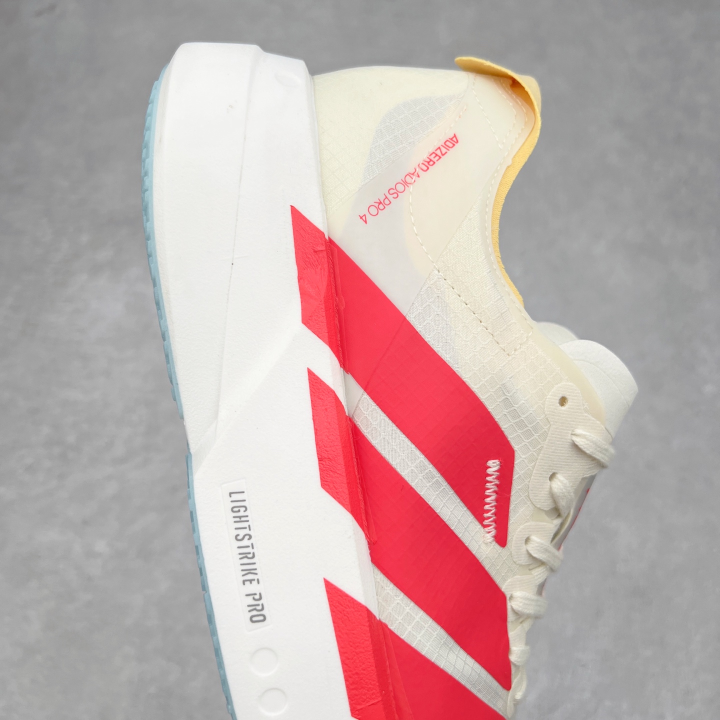 图片[6]-AD Adizero Adios Pro 4 马拉松竞速专业跑鞋 JR4542 CELERMESH针织网面非常轻薄 纤维间的缝隙很大 可以保证跑步时的透气、排汗效果 鞋舌直接与两侧的内衬和鞋底连接在一起 在跑步过程中不会被鞋舌的左右移动所困扰 在标准鞋带孔的基础上再拓宽一组鞋带孔 适合不同脚型的需求 突破性 EnergyRods 技术，有助于跑者实现更好的成绩 中底独特的LIGHTSTRIKE PRO泡棉材质 微弹感觉在跑步过程中给予了良好的支撑体验 对于顶级精英和高水平进阶跑者来说 ADIOS PRO是一双值得信赖的竞速比赛用鞋 尺码：36 36.5 37.5 38 38.5 39 40 40.5 41 42 42.5 43 44 44.5 45-选品中心