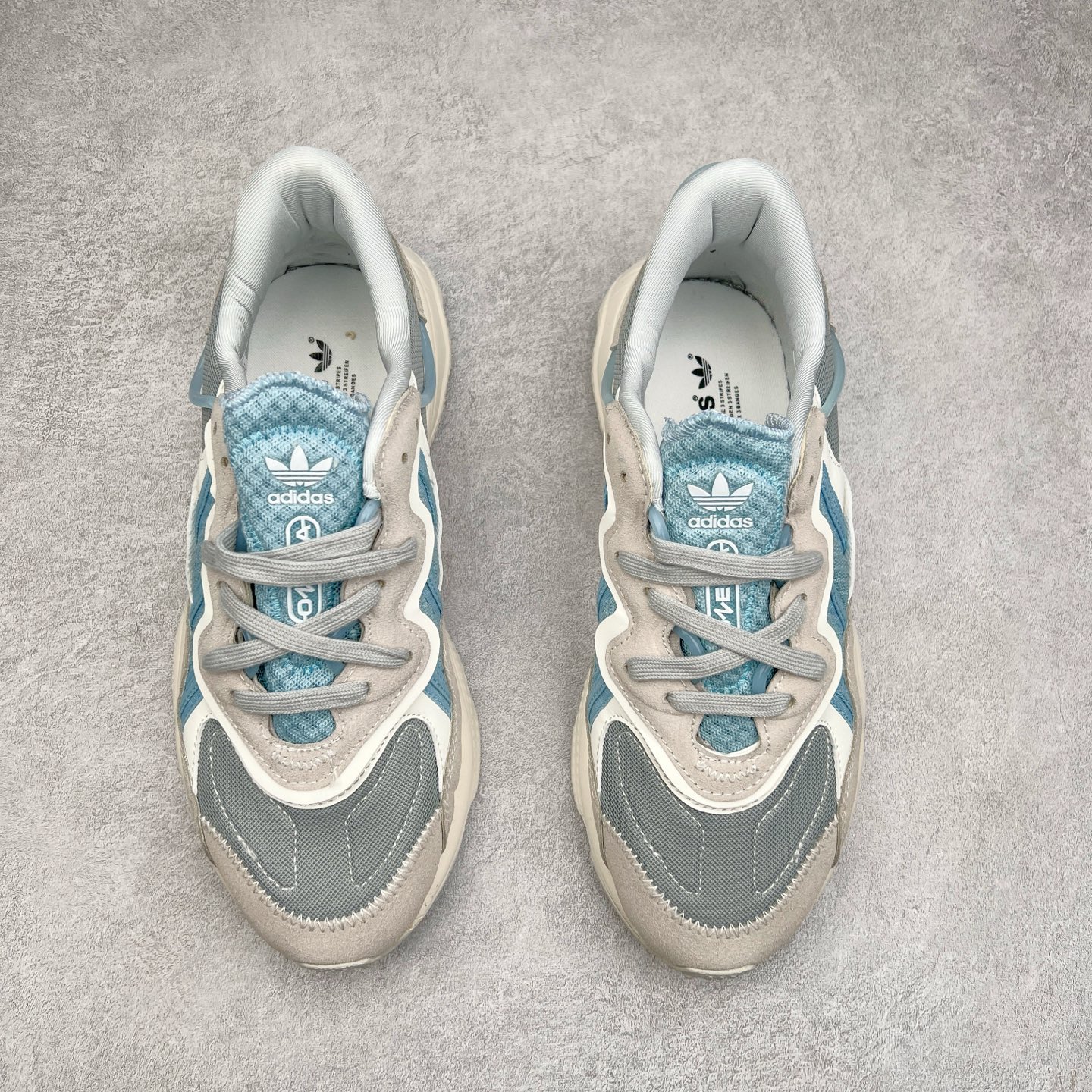 图片[2]-AD Originals OZWEEGO 简版椰子3M反光皮面水管复古老爹鞋 鞋面透气织物与出众皮革相互拼接 营造丰富层次 中底 adiPRENE+ 则提供穿着过程中的优良支撑 进一步提升舒适度 特别之处在于后跟半透明导管加持 个性又独特 最后辅以醒目色调营造强烈视觉反差 不凡的吸睛效果让人过目难忘 尺码：36 36.5 37 38 38.5 39 40 40.5 41 42 42.5 43 44 44.5 45-选品中心