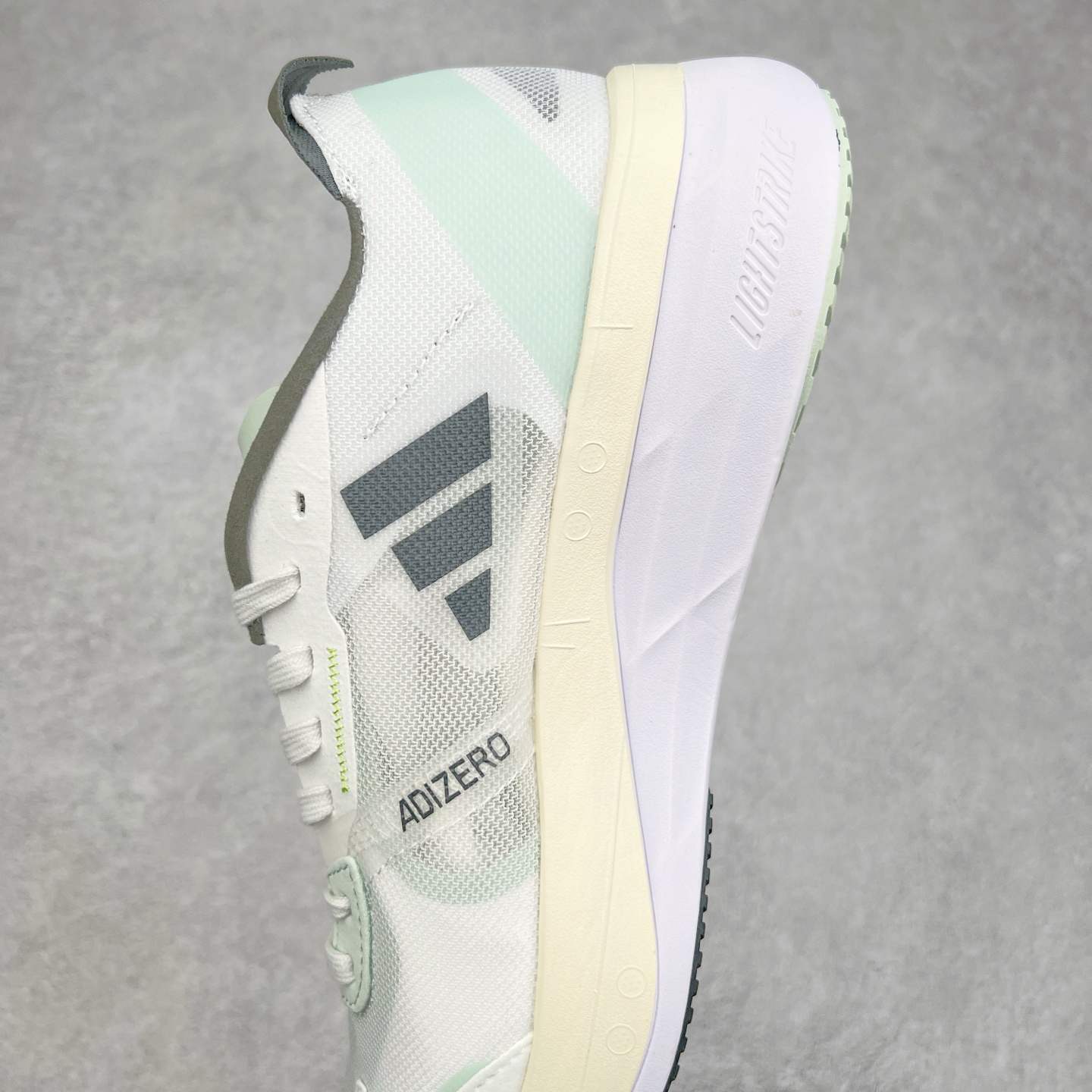 图片[7]-AD Adizero Boston 11 夏季透气网眼竞速跑鞋 GY8407 融合Lightstrike和Lightstrike Pro技术 采用乙烯/乙酸乙烯酯(EVA)材质 打造舒适中底 含ENERGYROD能量碳柱 旨在为步伐添活力 尺码：36 36.5 37 38 38.5 39 40 40.5 41 42 42.5 43 44 44.5 45-选品中心