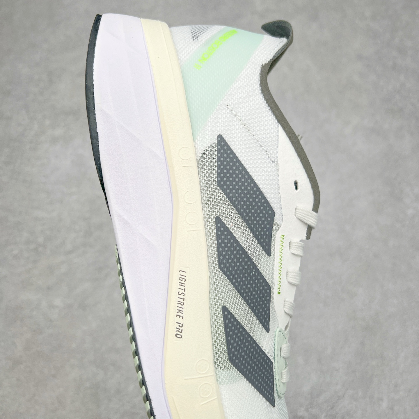 图片[6]-AD Adizero Boston 11 夏季透气网眼竞速跑鞋 GY8407 融合Lightstrike和Lightstrike Pro技术 采用乙烯/乙酸乙烯酯(EVA)材质 打造舒适中底 含ENERGYROD能量碳柱 旨在为步伐添活力 尺码：36 36.5 37 38 38.5 39 40 40.5 41 42 42.5 43 44 44.5 45-选品中心