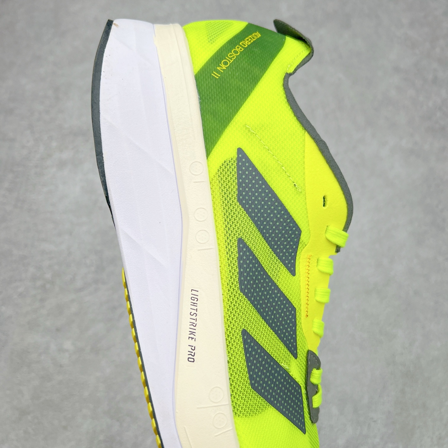 图片[6]-AD Adizero Boston 11 夏季透气网眼竞速跑鞋 GX6650 融合Lightstrike和Lightstrike Pro技术 采用乙烯/乙酸乙烯酯(EVA)材质 打造舒适中底 含ENERGYROD能量碳柱 旨在为步伐添活力 尺码：36 36.5 37 38 38.5 39 40 40.5 41 42 42.5 43 44 44.5 45-选品中心