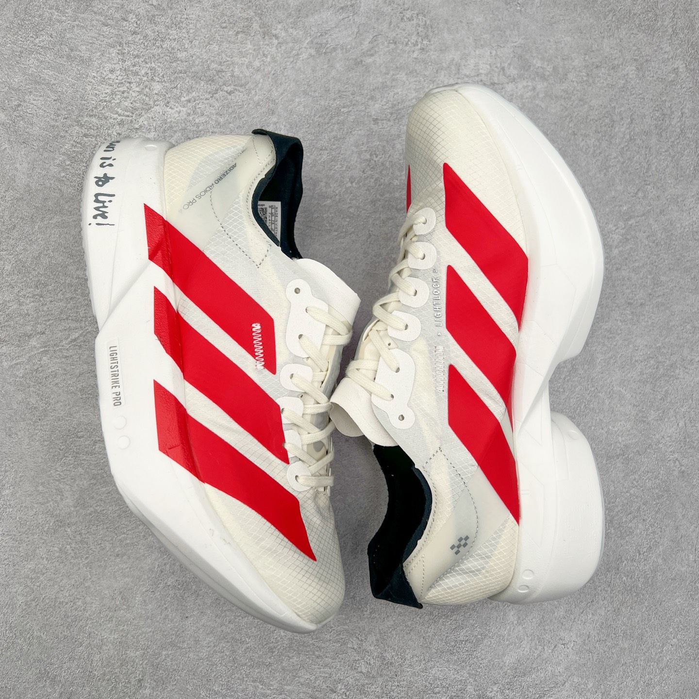 图片[3]-AD Adizero Adios Pro 4 马拉松竞速专业跑鞋 JR6363 CELERMESH针织网面非常轻薄 纤维间的缝隙很大 可以保证跑步时的透气、排汗效果 鞋舌直接与两侧的内衬和鞋底连接在一起 在跑步过程中不会被鞋舌的左右移动所困扰 在标准鞋带孔的基础上再拓宽一组鞋带孔 适合不同脚型的需求 突破性 EnergyRods 技术，有助于跑者实现更好的成绩 中底独特的LIGHTSTRIKE PRO泡棉材质 微弹感觉在跑步过程中给予了良好的支撑体验 对于顶级精英和高水平进阶跑者来说 ADIOS PRO是一双值得信赖的竞速比赛用鞋 尺码：36 36.5 37.5 38 38.5 39 40 40.5 41 42 42.5 43 44 44.5 45-选品中心