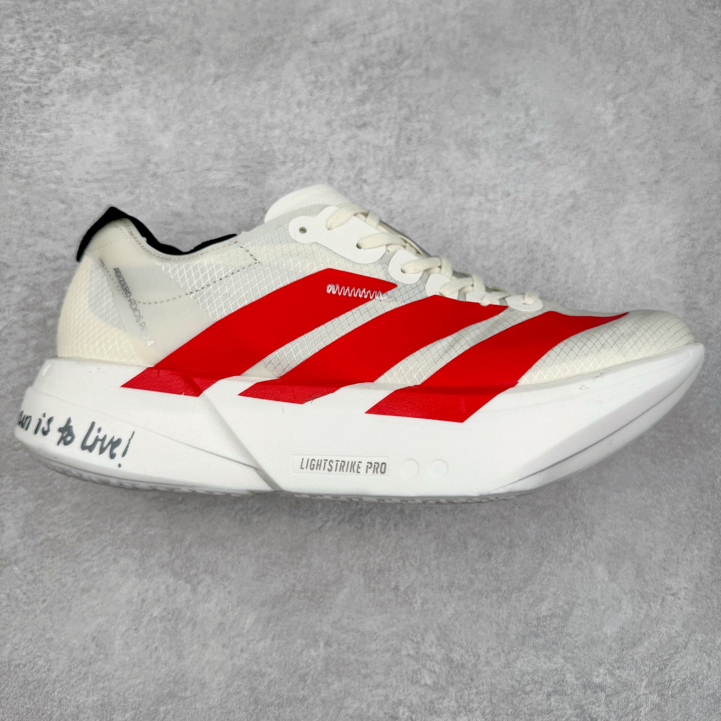 AD Adizero Adios Pro 4 马拉松竞速专业跑鞋 JR6363 CELERMESH针织网面非常轻薄 纤维间的缝隙很大 可以保证跑步时的透气、排汗效果 鞋舌直接与两侧的内衬和鞋底连接在一起 在跑步过程中不会被鞋舌的左右移动所困扰 在标准鞋带孔的基础上再拓宽一组鞋带孔 适合不同脚型的需求 突破性 EnergyRods 技术，有助于跑者实现更好的成绩 中底独特的LIGHTSTRIKE PRO泡棉材质 微弹感觉在跑步过程中给予了良好的支撑体验 对于顶级精英和高水平进阶跑者来说 ADIOS PRO是一双值得信赖的竞速比赛用鞋 尺码：36 36.5 37.5 38 38.5 39 40 40.5 41 42 42.5 43 44 44.5 45-选品中心