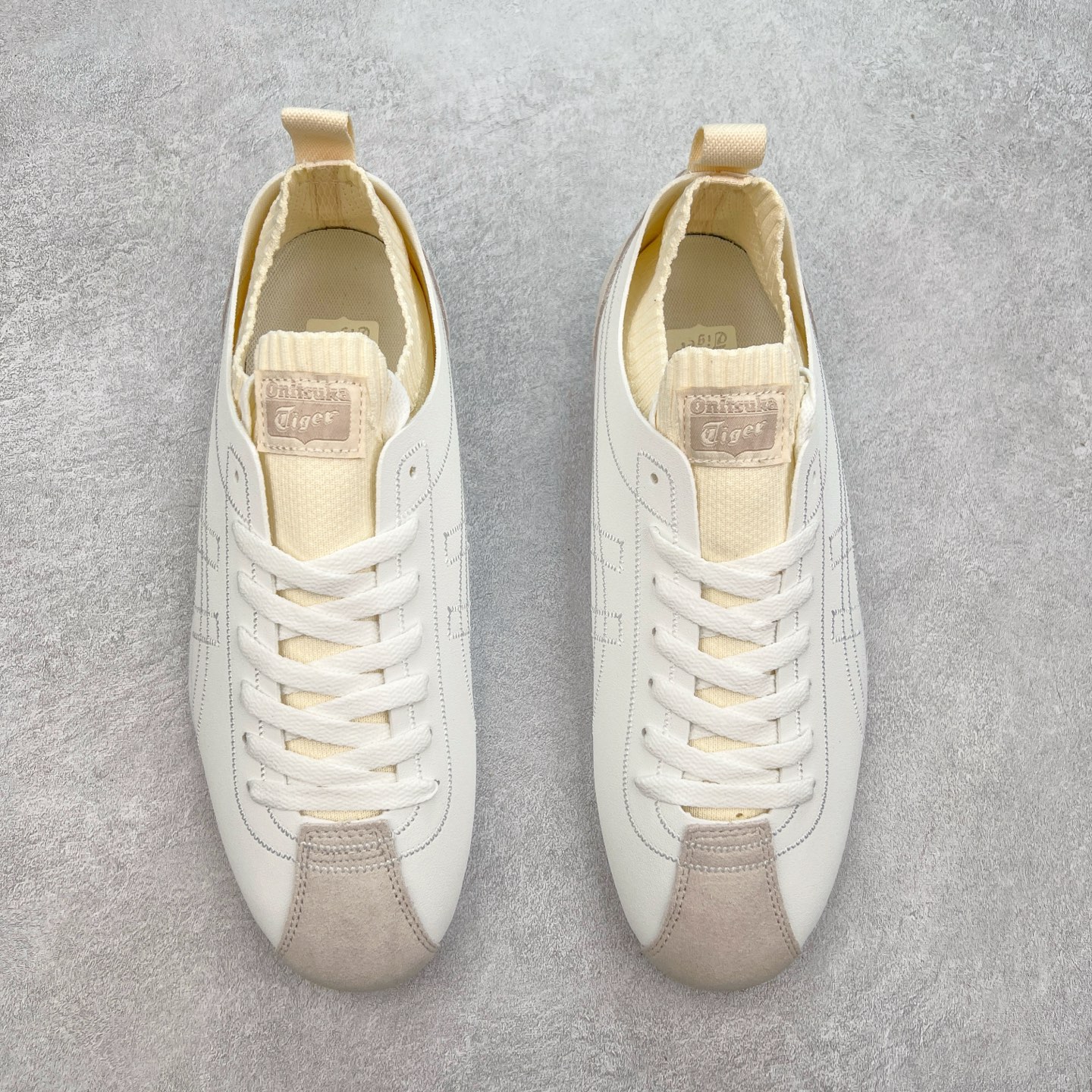 图片[2]-Onitsuka Tiger 鬼塚虎 Sclaw 轻便舒适防滑耐磨透气支撑吸汗低帮生活休闲鞋 低帮设计简洁利落 流畅的线条勾勒出随性的风格 鞋口织物收口 经典鞋袜一体 明线设计标志性logo 采用织物和柔软皮革拼接 时尚质感满满 防磨耐磨大底 上脚轻便舒适 尺码：36 37 37.5 38 39 39.5 40 40.5 41.5 42 42.5 43.5 44 45-选品中心