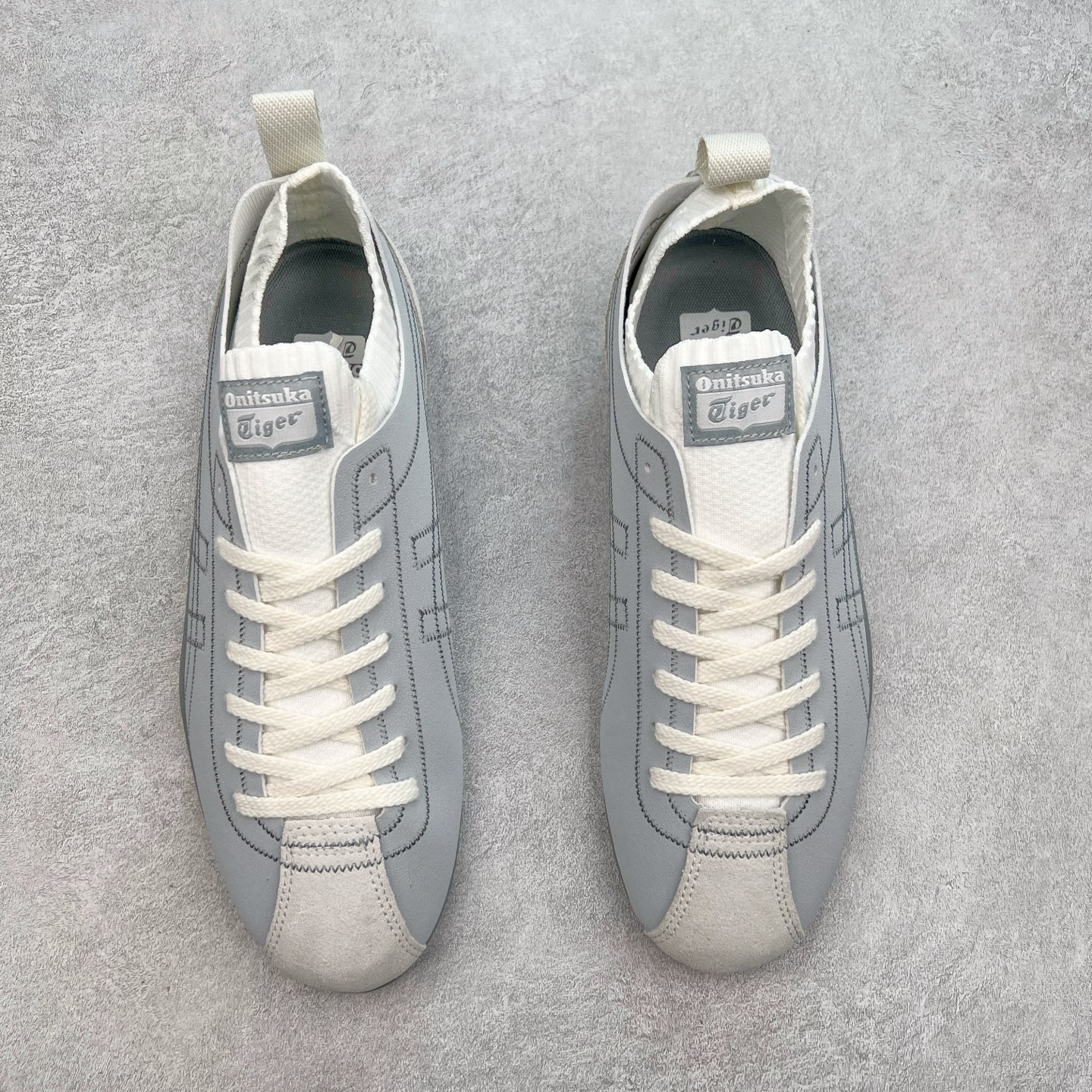 图片[2]-Onitsuka Tiger 鬼塚虎 Sclaw 轻便舒适防滑耐磨透气支撑吸汗低帮生活休闲鞋 低帮设计简洁利落 流畅的线条勾勒出随性的风格 鞋口织物收口 经典鞋袜一体 明线设计标志性logo 采用织物和柔软皮革拼接 时尚质感满满 防磨耐磨大底 上脚轻便舒适 尺码：36 37 37.5 38 39 39.5 40 40.5 41.5 42 42.5 43.5 44 45-选品中心