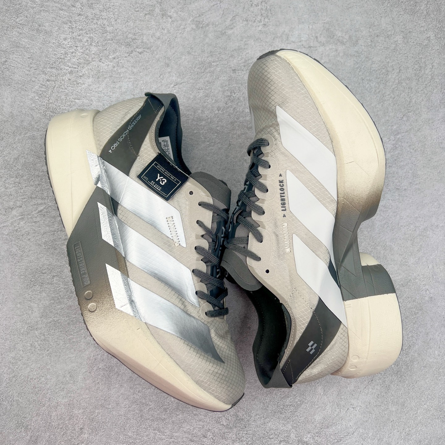 图片[3]-AD Adizero Adios Pro 4 马拉松竞速专业跑鞋 JS3148 CELERMESH针织网面非常轻薄 纤维间的缝隙很大 可以保证跑步时的透气、排汗效果 鞋舌直接与两侧的内衬和鞋底连接在一起 在跑步过程中不会被鞋舌的左右移动所困扰 在标准鞋带孔的基础上再拓宽一组鞋带孔 适合不同脚型的需求 突破性 EnergyRods 技术，有助于跑者实现更好的成绩 中底独特的LIGHTSTRIKE PRO泡棉材质 微弹感觉在跑步过程中给予了良好的支撑体验 对于顶级精英和高水平进阶跑者来说 ADIOS PRO是一双值得信赖的竞速比赛用鞋 尺码：36 36.5 37.5 38 38.5 39 40 40.5 41 42 42.5 43 44 44.5 45-选品中心