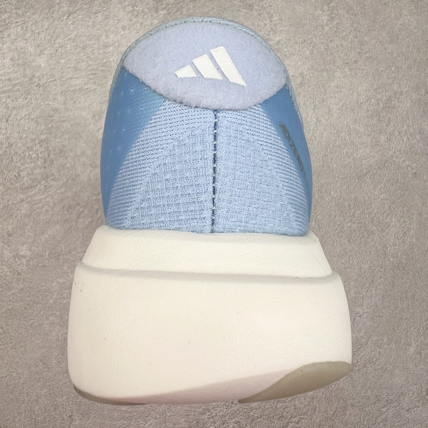 图片[8]-AD Adizero EVO SL 马拉松竞速专业跑鞋 JS4453 CELERMESH针织网面非常轻薄 纤维间的缝隙很大 可以保证跑步时的透气、排汗效果 鞋舌直接与两侧的内衬和鞋底连接在一起 在跑步过程中不会被鞋舌的左右移动所困扰 在标准鞋带孔的基础上再拓宽一组鞋带孔 适合不同脚型的需求 突破性 EnergyRods 技术，有助于跑者实现更好的成绩 中底独特的LIGHTSTRIKE PRO泡棉材质 微弹感觉在跑步过程中给予了良好的支撑体验 对于顶级精英和高水平进阶跑者来说 ADIOS PRO是一双值得信赖的竞速比赛用鞋 尺码：36 36.5 37.5 38 38.5 39 40 40.5 41 42 42.5 43 44 44.5 45-选品中心