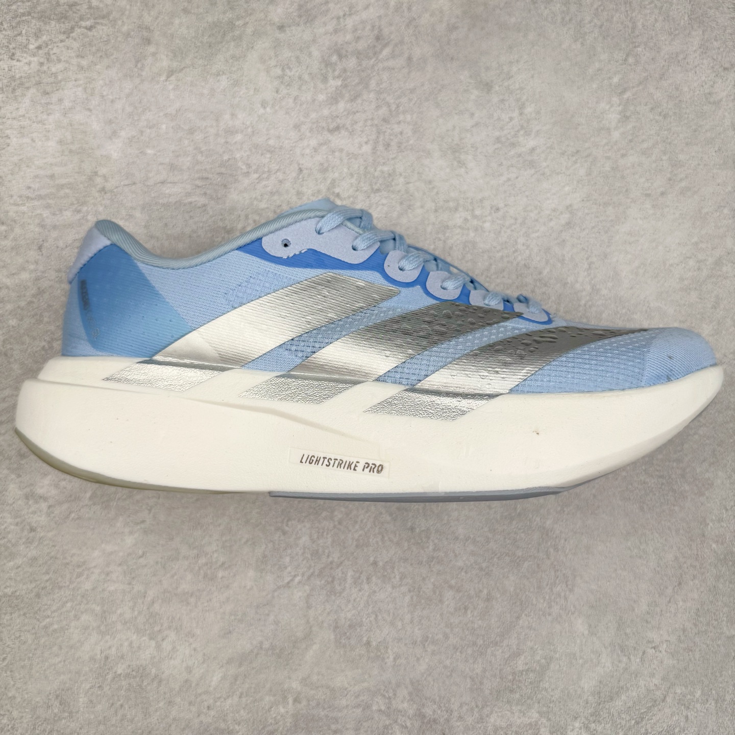 AD Adizero EVO SL 马拉松竞速专业跑鞋 JS4453 CELERMESH针织网面非常轻薄 纤维间的缝隙很大 可以保证跑步时的透气、排汗效果 鞋舌直接与两侧的内衬和鞋底连接在一起 在跑步过程中不会被鞋舌的左右移动所困扰 在标准鞋带孔的基础上再拓宽一组鞋带孔 适合不同脚型的需求 突破性 EnergyRods 技术，有助于跑者实现更好的成绩 中底独特的LIGHTSTRIKE PRO泡棉材质 微弹感觉在跑步过程中给予了良好的支撑体验 对于顶级精英和高水平进阶跑者来说 ADIOS PRO是一双值得信赖的竞速比赛用鞋 尺码：36 36.5 37.5 38 38.5 39 40 40.5 41 42 42.5 43 44 44.5 45-选品中心