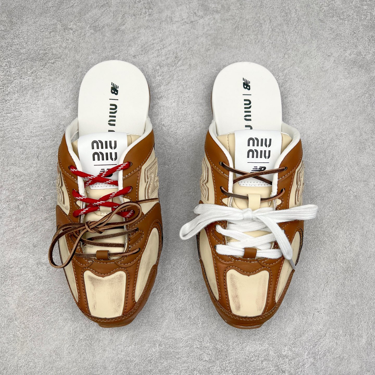 图片[2]-MiuMiu x New Balance NB530 SL 缪缪联名系列低帮经典复古休闲运动鞋半拖 近几年运动品牌与各大潮流品牌不断推出联名产品，在球鞋圈拥有极高的热度。此外，奢侈品牌和运动品牌联名也早已非新鲜事，继 Dior 和 Jordan Brand 以及 Prada 和 adidas 合作后。近日，Miu Miu与New Balance的合作基本已经成为定番，每年都会上新，而近期的最新联名也已经正式曝光，预计会在24年春夏面世！相比之前两次使用的574，这次Miu Miu带来了全新风格。采用了全新型号MR530进行设计，继续使用复古的旧化效果和去年就被带火的美拉德配色打造。Miu Miu作为千禧文化的重要推手，这次也是直接挑选了New Balance 2000年代时发布的健身跑鞋MR530。整体做旧效果非常明显，甚至有些二手鞋的感觉，多少是有点瘦巴黎世家影响了……配色方面将会推出米色和棕色两种颜色可供选择，整体覆盖了做旧麂皮，鞋舌和鞋垫和之前一致，有Miu Miu的Logo，同时搭配皮革和棉质双鞋带组成。尺码：36 37 37.5 38 38.5 39.5 40 40.5 41.5 42 42.5 43.5 44 44.5 45-选品中心