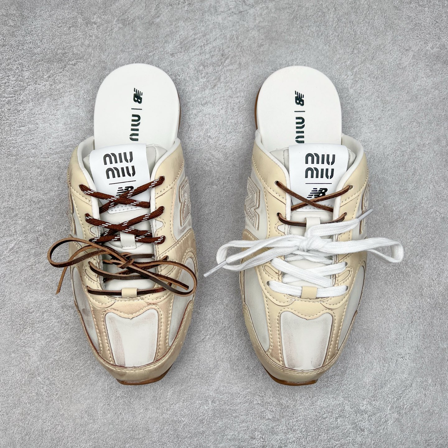 图片[2]-MiuMiu x New Balance NB530 SL 缪缪联名系列低帮经典复古休闲运动鞋半拖 近几年运动品牌与各大潮流品牌不断推出联名产品，在球鞋圈拥有极高的热度。此外，奢侈品牌和运动品牌联名也早已非新鲜事，继 Dior 和 Jordan Brand 以及 Prada 和 adidas 合作后。近日，Miu Miu与New Balance的合作基本已经成为定番，每年都会上新，而近期的最新联名也已经正式曝光，预计会在24年春夏面世！相比之前两次使用的574，这次Miu Miu带来了全新风格。采用了全新型号MR530进行设计，继续使用复古的旧化效果和去年就被带火的美拉德配色打造。Miu Miu作为千禧文化的重要推手，这次也是直接挑选了New Balance 2000年代时发布的健身跑鞋MR530。整体做旧效果非常明显，甚至有些二手鞋的感觉，多少是有点瘦巴黎世家影响了……配色方面将会推出米色和棕色两种颜色可供选择，整体覆盖了做旧麂皮，鞋舌和鞋垫和之前一致，有Miu Miu的Logo，同时搭配皮革和棉质双鞋带组成。尺码：36 37 37.5 38 38.5 39.5 40 40.5 41.5 42 42.5 43.5 44 44.5 45-选品中心