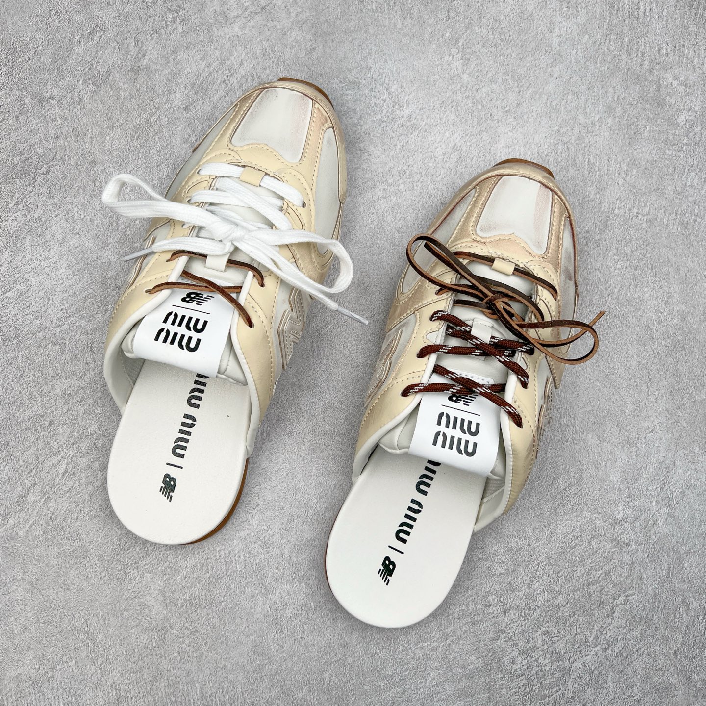 图片[3]-MiuMiu x New Balance NB530 SL 缪缪联名系列低帮经典复古休闲运动鞋半拖 近几年运动品牌与各大潮流品牌不断推出联名产品，在球鞋圈拥有极高的热度。此外，奢侈品牌和运动品牌联名也早已非新鲜事，继 Dior 和 Jordan Brand 以及 Prada 和 adidas 合作后。近日，Miu Miu与New Balance的合作基本已经成为定番，每年都会上新，而近期的最新联名也已经正式曝光，预计会在24年春夏面世！相比之前两次使用的574，这次Miu Miu带来了全新风格。采用了全新型号MR530进行设计，继续使用复古的旧化效果和去年就被带火的美拉德配色打造。Miu Miu作为千禧文化的重要推手，这次也是直接挑选了New Balance 2000年代时发布的健身跑鞋MR530。整体做旧效果非常明显，甚至有些二手鞋的感觉，多少是有点瘦巴黎世家影响了……配色方面将会推出米色和棕色两种颜色可供选择，整体覆盖了做旧麂皮，鞋舌和鞋垫和之前一致，有Miu Miu的Logo，同时搭配皮革和棉质双鞋带组成。尺码：36 37 37.5 38 38.5 39.5 40 40.5 41.5 42 42.5 43.5 44 44.5 45-选品中心