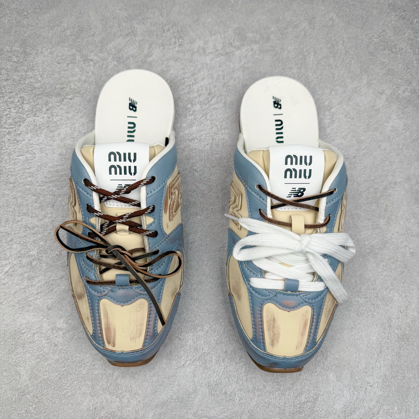 图片[2]-MiuMiu x New Balance NB530 SL 缪缪联名系列低帮经典复古休闲运动鞋半拖 近几年运动品牌与各大潮流品牌不断推出联名产品，在球鞋圈拥有极高的热度。此外，奢侈品牌和运动品牌联名也早已非新鲜事，继 Dior 和 Jordan Brand 以及 Prada 和 adidas 合作后。近日，Miu Miu与New Balance的合作基本已经成为定番，每年都会上新，而近期的最新联名也已经正式曝光，预计会在24年春夏面世！相比之前两次使用的574，这次Miu Miu带来了全新风格。采用了全新型号MR530进行设计，继续使用复古的旧化效果和去年就被带火的美拉德配色打造。Miu Miu作为千禧文化的重要推手，这次也是直接挑选了New Balance 2000年代时发布的健身跑鞋MR530。整体做旧效果非常明显，甚至有些二手鞋的感觉，多少是有点瘦巴黎世家影响了……配色方面将会推出米色和棕色两种颜色可供选择，整体覆盖了做旧麂皮，鞋舌和鞋垫和之前一致，有Miu Miu的Logo，同时搭配皮革和棉质双鞋带组成。尺码：36 37 37.5 38 38.5 39.5 40 40.5 41.5 42 42.5 43.5 44 44.5 45-选品中心