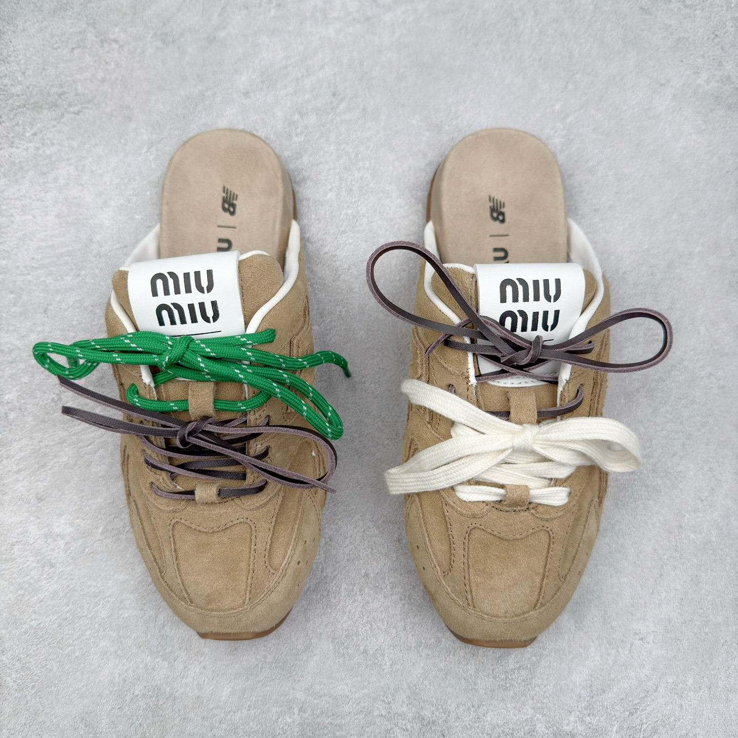 图片[2]-MiuMiu x New Balance NB530 SL 缪缪联名系列低帮经典复古休闲运动鞋半拖 近几年运动品牌与各大潮流品牌不断推出联名产品，在球鞋圈拥有极高的热度。此外，奢侈品牌和运动品牌联名也早已非新鲜事，继 Dior 和 Jordan Brand 以及 Prada 和 adidas 合作后。近日，Miu Miu与New Balance的合作基本已经成为定番，每年都会上新，而近期的最新联名也已经正式曝光，预计会在24年春夏面世！相比之前两次使用的574，这次Miu Miu带来了全新风格。采用了全新型号MR530进行设计，继续使用复古的旧化效果和去年就被带火的美拉德配色打造。Miu Miu作为千禧文化的重要推手，这次也是直接挑选了New Balance 2000年代时发布的健身跑鞋MR530。整体做旧效果非常明显，甚至有些二手鞋的感觉，多少是有点瘦巴黎世家影响了……配色方面将会推出米色和棕色两种颜色可供选择，整体覆盖了做旧麂皮，鞋舌和鞋垫和之前一致，有Miu Miu的Logo，同时搭配皮革和棉质双鞋带组成。尺码：36 37 37.5 38 38.5 39.5 40 40.5 41.5 42 42.5 43.5 44 44.5 45-选品中心