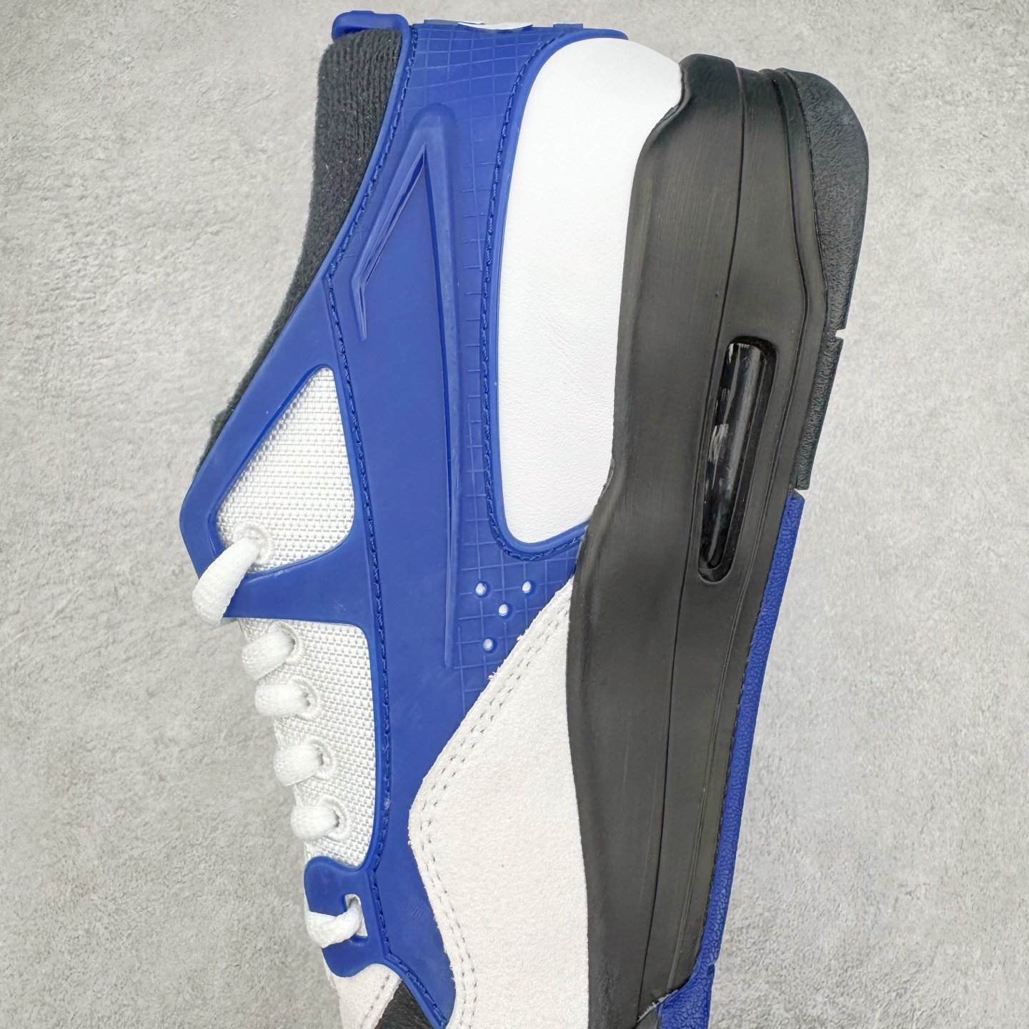 图片[7]-＃KZ纯原 Air Jordan AJ4 RM 重制版低帮复古篮球鞋 黑蓝 FQ7939-140 亲自操刀耗时半年巨作 全套原纸板楦头开发 确保原汁原味 完美呈现版型 一比一鞋头弧度高度鞋身弧度 原厂TPU 正确内里网布 菱角分明不变形无多余毛边 柔软性质感一致于原鞋 原厂织唛标 原厂飞人电绣工艺 尾指中部跳三针 独家绑鞋带手法 印刷中底布 四线拉帮 米色美纹纸贴合固定 进口港宝加持 后跟自然饱满 全鞋荧光划线卡点 追求极致完美 每一双都是工艺品 多重QC质检 超越公司货的品控标准 实实在在的免检产品 采用了低帮的设计 并保留了众多AJ4的经典元素 鞋身以皮革、麂皮材质拼接打造 AJ4经典的TPU材质延伸至后跟 增强鞋款稳定性 而鞋身侧面的网格设计则被取消 尾部的NIKE AIR标志也得到保留 并同时带有飞人logo 中底部分同样搭载了可视AIR气垫 鞋底采用米白色中底和外底呈现 为整个设计收尾 尺码：36 36.5 37.5 38 38.5 39 40 40.5 41 42 42.5 43 44 44.5 45 46 47.5-选品中心