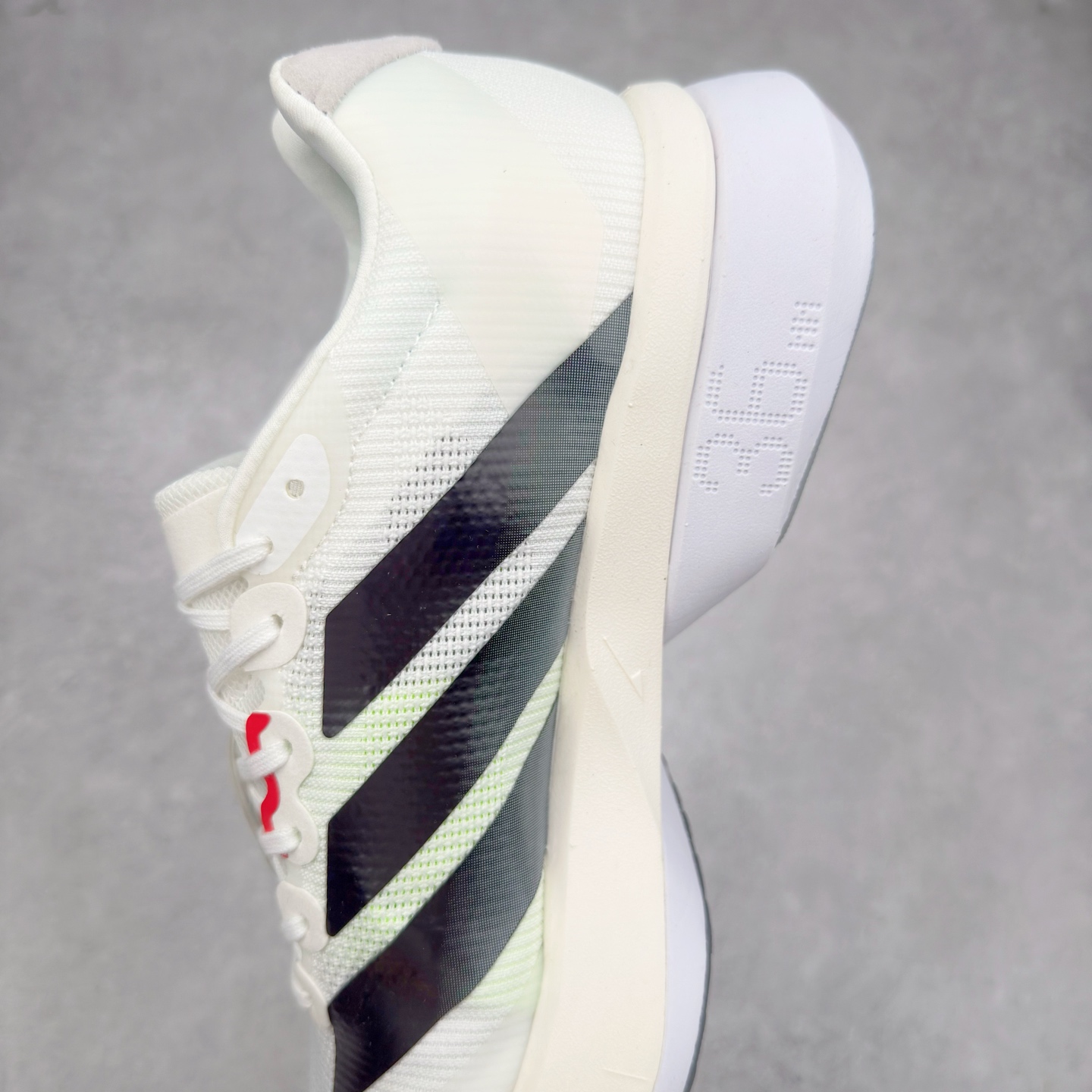 图片[7]-AD Adizero Boston 13 夏季透气网眼竞速跑鞋 JS4934 融合Lightstrike和Lightstrike Pro技术 采用乙烯/乙酸乙烯酯(EVA)材质 打造舒适中底 含ENERGYROD能量碳柱 旨在为步伐添活力 尺码：36 36.5 37 38 38.5 39 40 40.5 41 42 42.5 43 44 44.5 45-选品中心