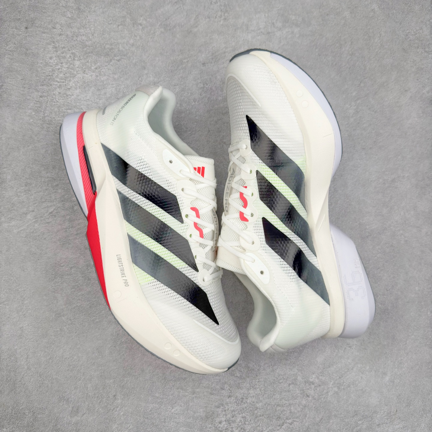 图片[3]-AD Adizero Boston 13 夏季透气网眼竞速跑鞋 JS4934 融合Lightstrike和Lightstrike Pro技术 采用乙烯/乙酸乙烯酯(EVA)材质 打造舒适中底 含ENERGYROD能量碳柱 旨在为步伐添活力 尺码：36 36.5 37 38 38.5 39 40 40.5 41 42 42.5 43 44 44.5 45-选品中心