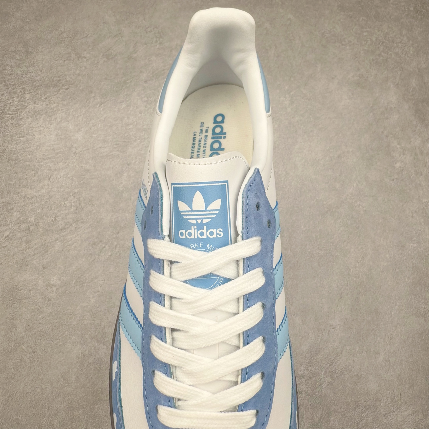 图片[5]-AD Original Samba OG 复古经典轻便板鞋 FW2413 这款桑巴鞋展示了高质量的工艺 带有装饰的超锁缝制和无缝的手感 柔软、柔软的皮革造型和标志性的3条纹完成了精致的外观 正规合身鞋带 鞋面上有绒面鞋垫 橡胶鞋底 享受正畸套筒软感 自50年代首次亮相以来就一直在赢得粉丝的青睐 尺码：36 36.5 37.5 38 38.5 39 40 40.5 41 42 42.5 43 44 44.5 45-选品中心