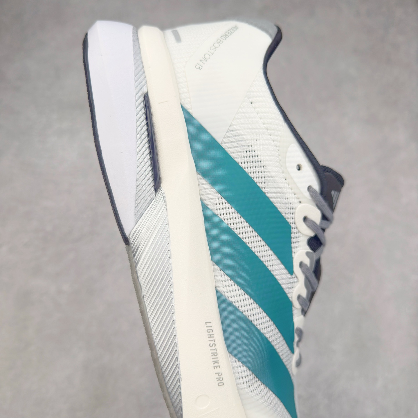 图片[6]-AD Adizero Boston 13 夏季透气网眼竞速跑鞋 JS4791 融合Lightstrike和Lightstrike Pro技术 采用乙烯/乙酸乙烯酯(EVA)材质 打造舒适中底 含ENERGYROD能量碳柱 旨在为步伐添活力 尺码：36 36.5 37 38 38.5 39 40 40.5 41 42 42.5 43 44 44.5 45-选品中心