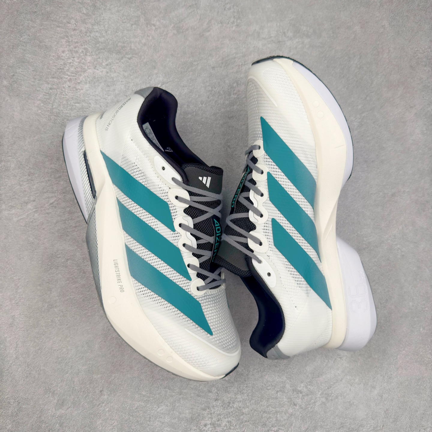 图片[3]-AD Adizero Boston 13 夏季透气网眼竞速跑鞋 JS4791 融合Lightstrike和Lightstrike Pro技术 采用乙烯/乙酸乙烯酯(EVA)材质 打造舒适中底 含ENERGYROD能量碳柱 旨在为步伐添活力 尺码：36 36.5 37 38 38.5 39 40 40.5 41 42 42.5 43 44 44.5 45-选品中心