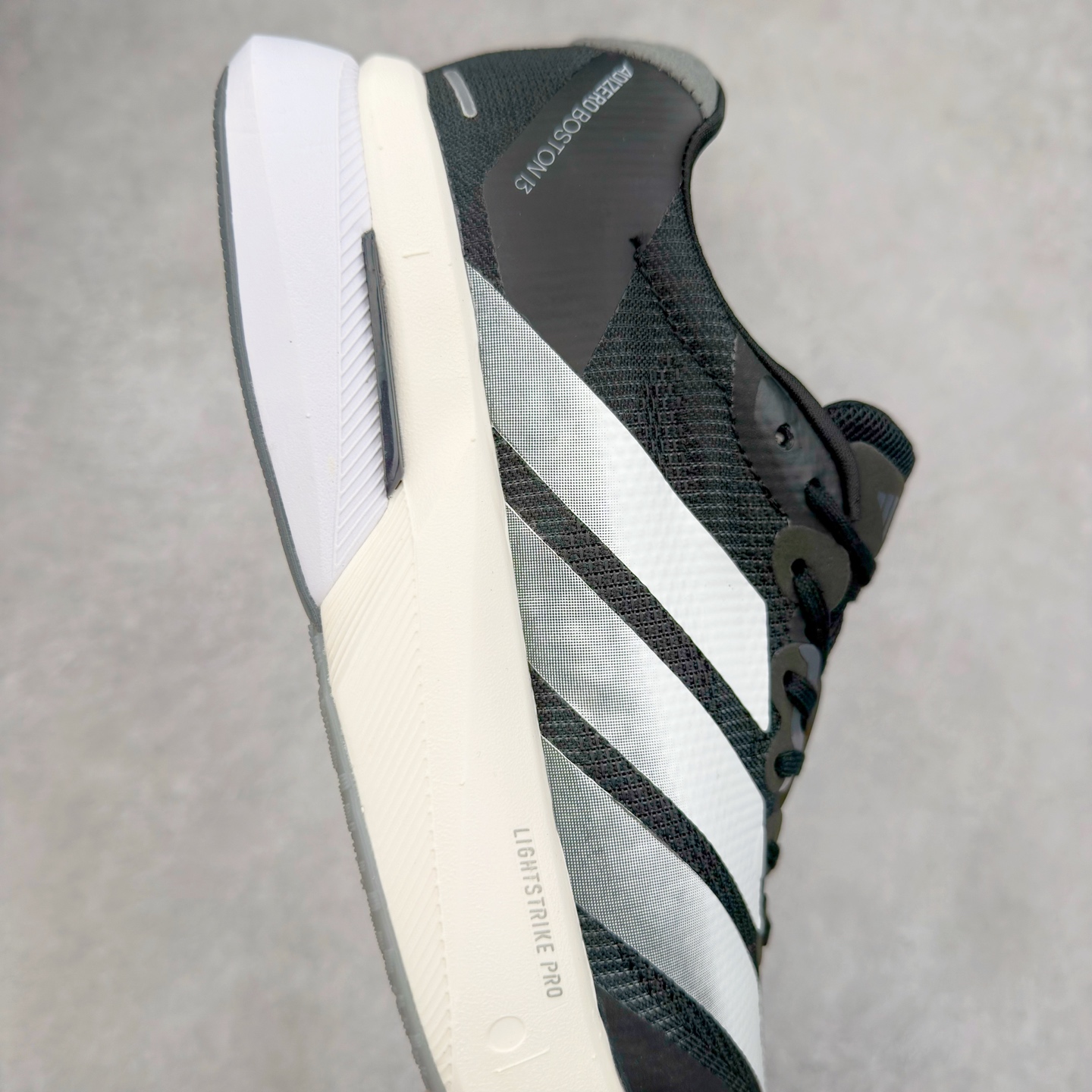 图片[6]-AD Adizero Boston 13 夏季透气网眼竞速跑鞋 JS4938 融合Lightstrike和Lightstrike Pro技术 采用乙烯/乙酸乙烯酯(EVA)材质 打造舒适中底 含ENERGYROD能量碳柱 旨在为步伐添活力 尺码：36 36.5 37 38 38.5 39 40 40.5 41 42 42.5 43 44 44.5 45-选品中心