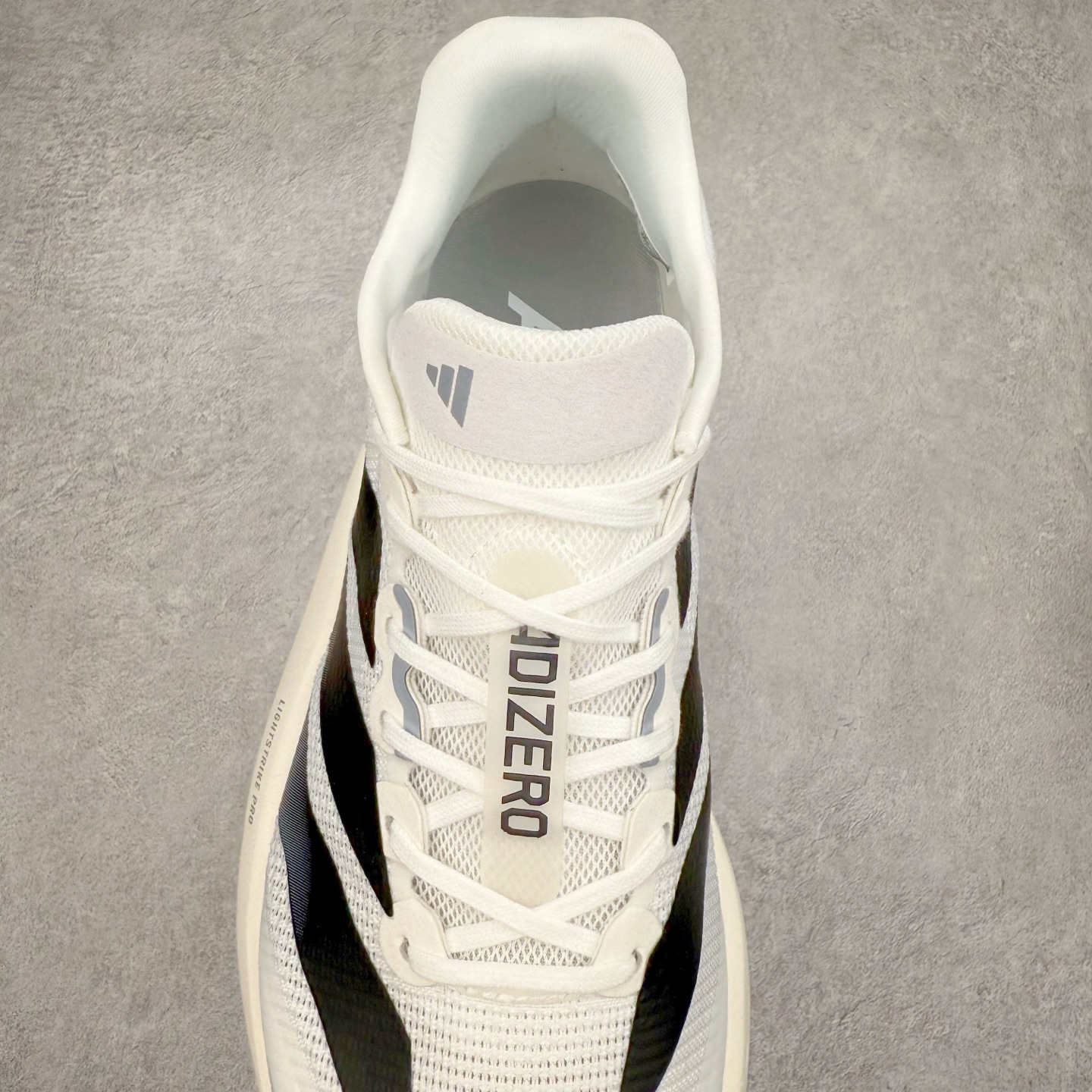 图片[5]-AD Adizero Boston 13 夏季透气网眼竞速跑鞋 JS4939 融合Lightstrike和Lightstrike Pro技术 采用乙烯/乙酸乙烯酯(EVA)材质 打造舒适中底 含ENERGYROD能量碳柱 旨在为步伐添活力 尺码：36 36.5 37 38 38.5 39 40 40.5 41 42 42.5 43 44 44.5 45-选品中心