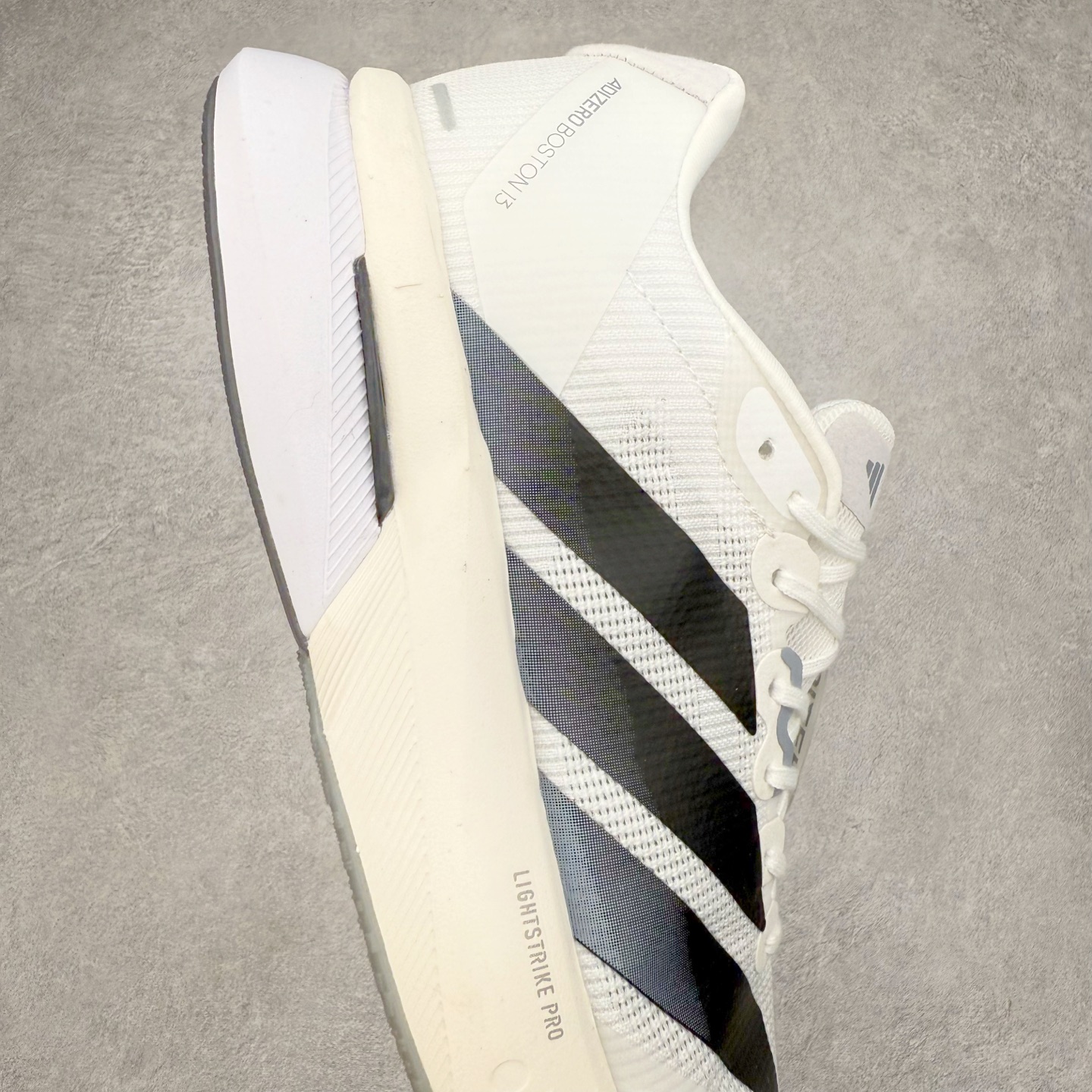 图片[6]-AD Adizero Boston 13 夏季透气网眼竞速跑鞋 JS4939 融合Lightstrike和Lightstrike Pro技术 采用乙烯/乙酸乙烯酯(EVA)材质 打造舒适中底 含ENERGYROD能量碳柱 旨在为步伐添活力 尺码：36 36.5 37 38 38.5 39 40 40.5 41 42 42.5 43 44 44.5 45-选品中心