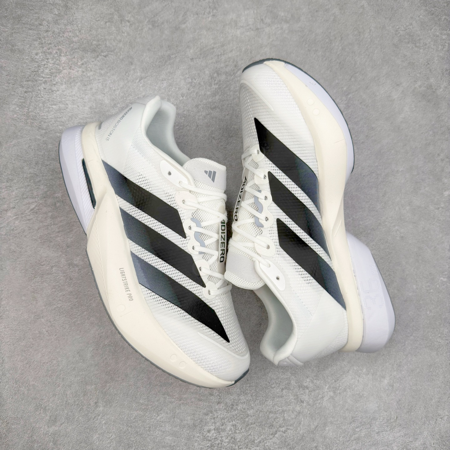 图片[3]-AD Adizero Boston 13 夏季透气网眼竞速跑鞋 JS4939 融合Lightstrike和Lightstrike Pro技术 采用乙烯/乙酸乙烯酯(EVA)材质 打造舒适中底 含ENERGYROD能量碳柱 旨在为步伐添活力 尺码：36 36.5 37 38 38.5 39 40 40.5 41 42 42.5 43 44 44.5 45-选品中心