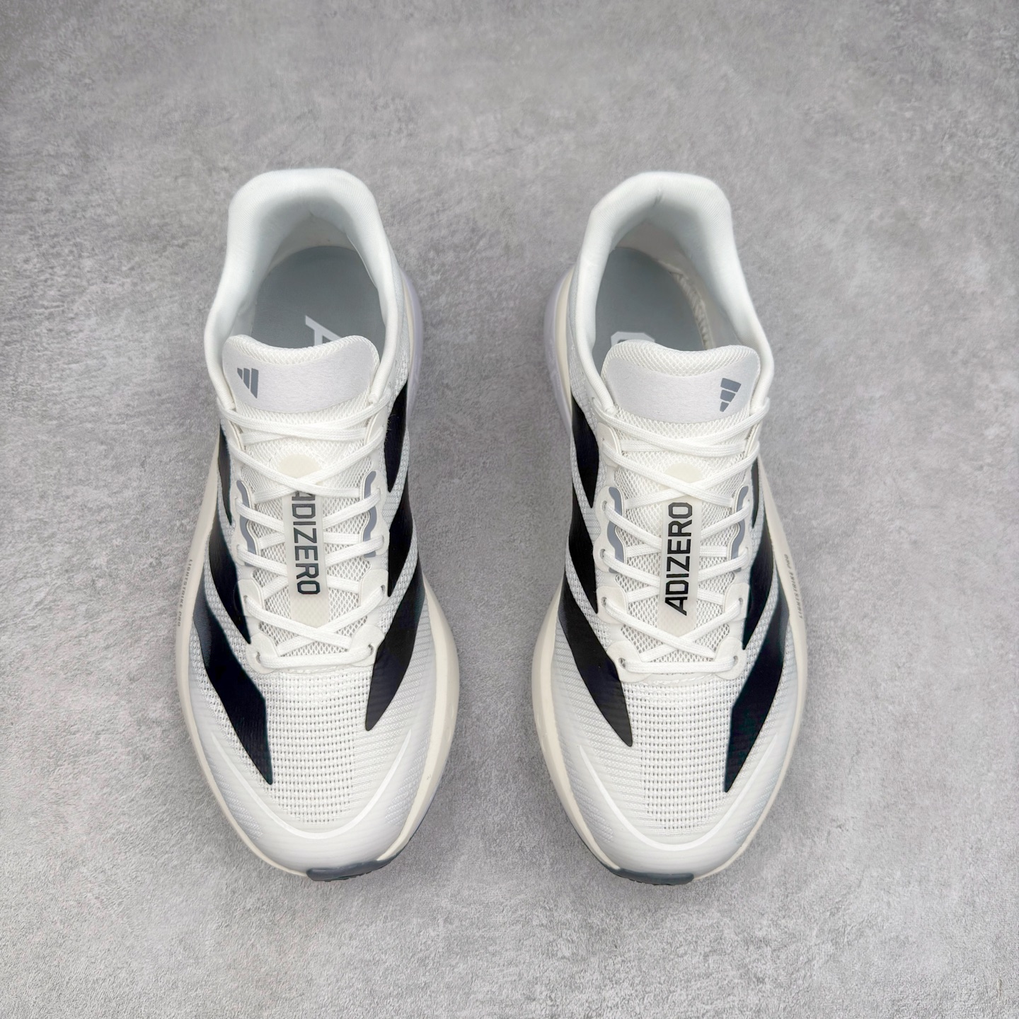 图片[2]-AD Adizero Boston 13 夏季透气网眼竞速跑鞋 JS4939 融合Lightstrike和Lightstrike Pro技术 采用乙烯/乙酸乙烯酯(EVA)材质 打造舒适中底 含ENERGYROD能量碳柱 旨在为步伐添活力 尺码：36 36.5 37 38 38.5 39 40 40.5 41 42 42.5 43 44 44.5 45-选品中心