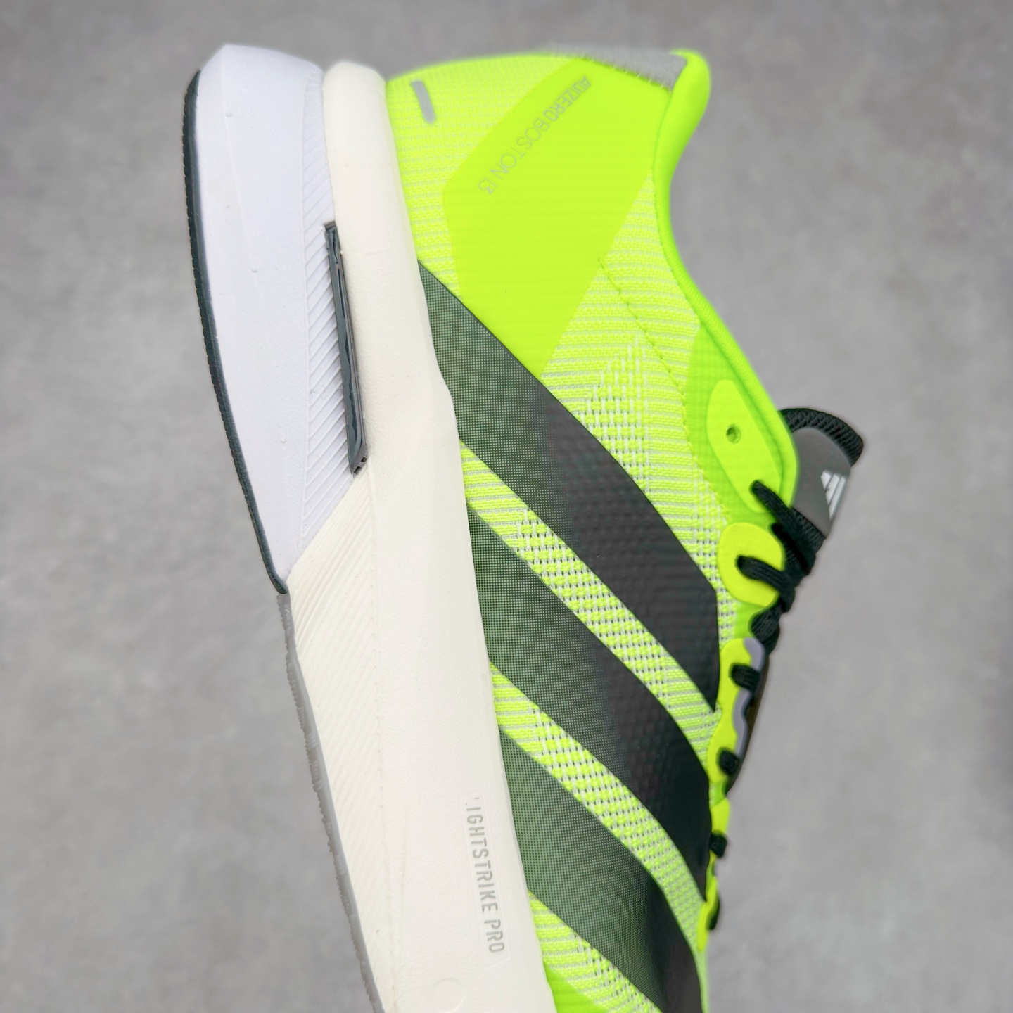 图片[6]-AD Adizero Boston 13 夏季透气网眼竞速跑鞋 JS4933 融合Lightstrike和Lightstrike Pro技术 采用乙烯/乙酸乙烯酯(EVA)材质 打造舒适中底 含ENERGYROD能量碳柱 旨在为步伐添活力 尺码：36 36.5 37 38 38.5 39 40 40.5 41 42 42.5 43 44 44.5 45-选品中心