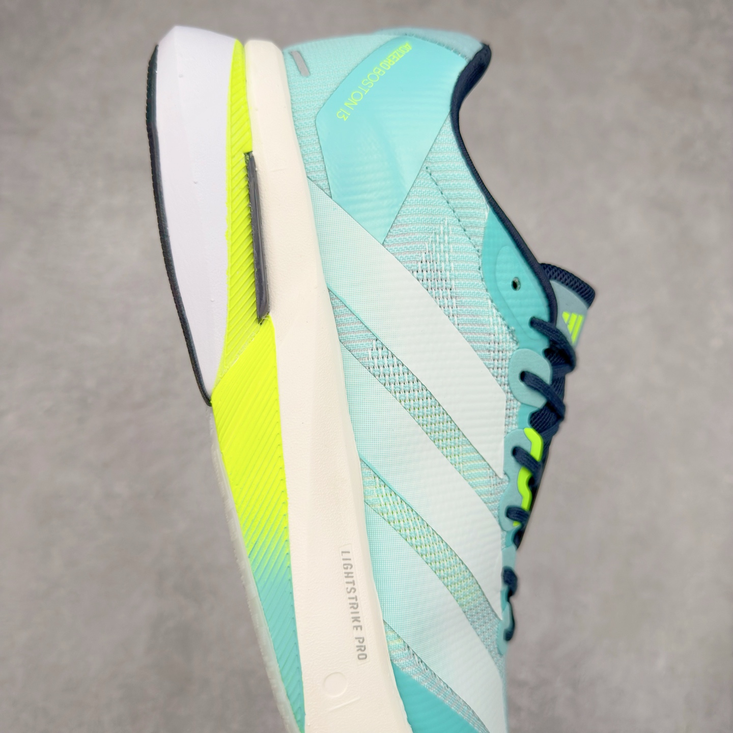 图片[6]-AD Adizero Boston 13 夏季透气网眼竞速跑鞋 JS4945 融合Lightstrike和Lightstrike Pro技术 采用乙烯/乙酸乙烯酯(EVA)材质 打造舒适中底 含ENERGYROD能量碳柱 旨在为步伐添活力 尺码：36 36.5 37 38 38.5 39 40 40.5 41 42 42.5 43 44 44.5 45-选品中心