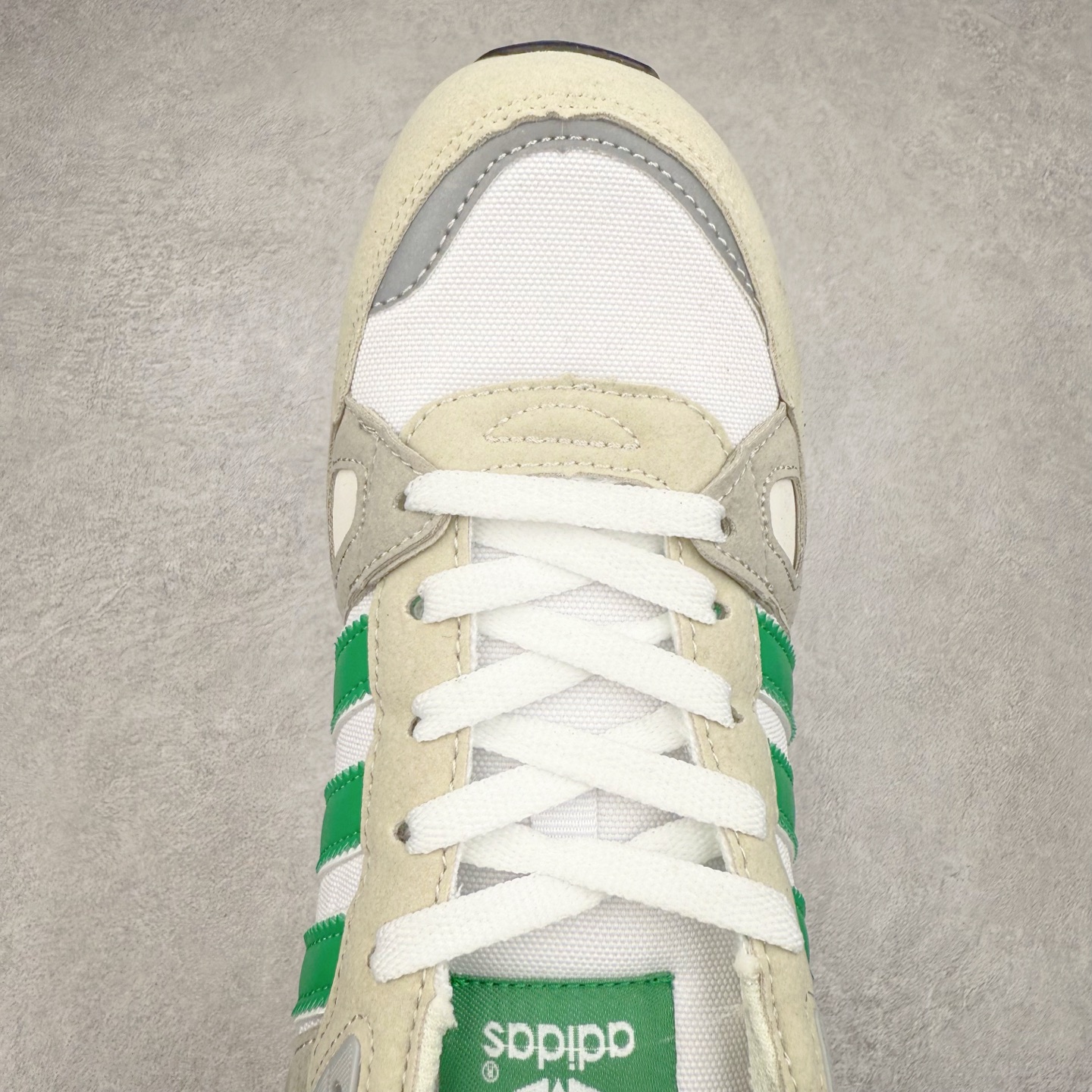 图片[4]-AD Original ZX750 经典复古情侣跑鞋 经典采用多种材料混合以及多种颜色的混搭元素的设计理念并沿袭ZX系列传统 采用热塑性聚氨酯橡胶（TPU）鞋跟笼，搭配EVA中底，穿着舒适 更有全系标配舒适OrthoLite®鞋垫和橡胶外底！尺码：36 36.5 37 38 38.5 39 40 40.5 41 42 42.5 43 44 44.5 45-选品中心