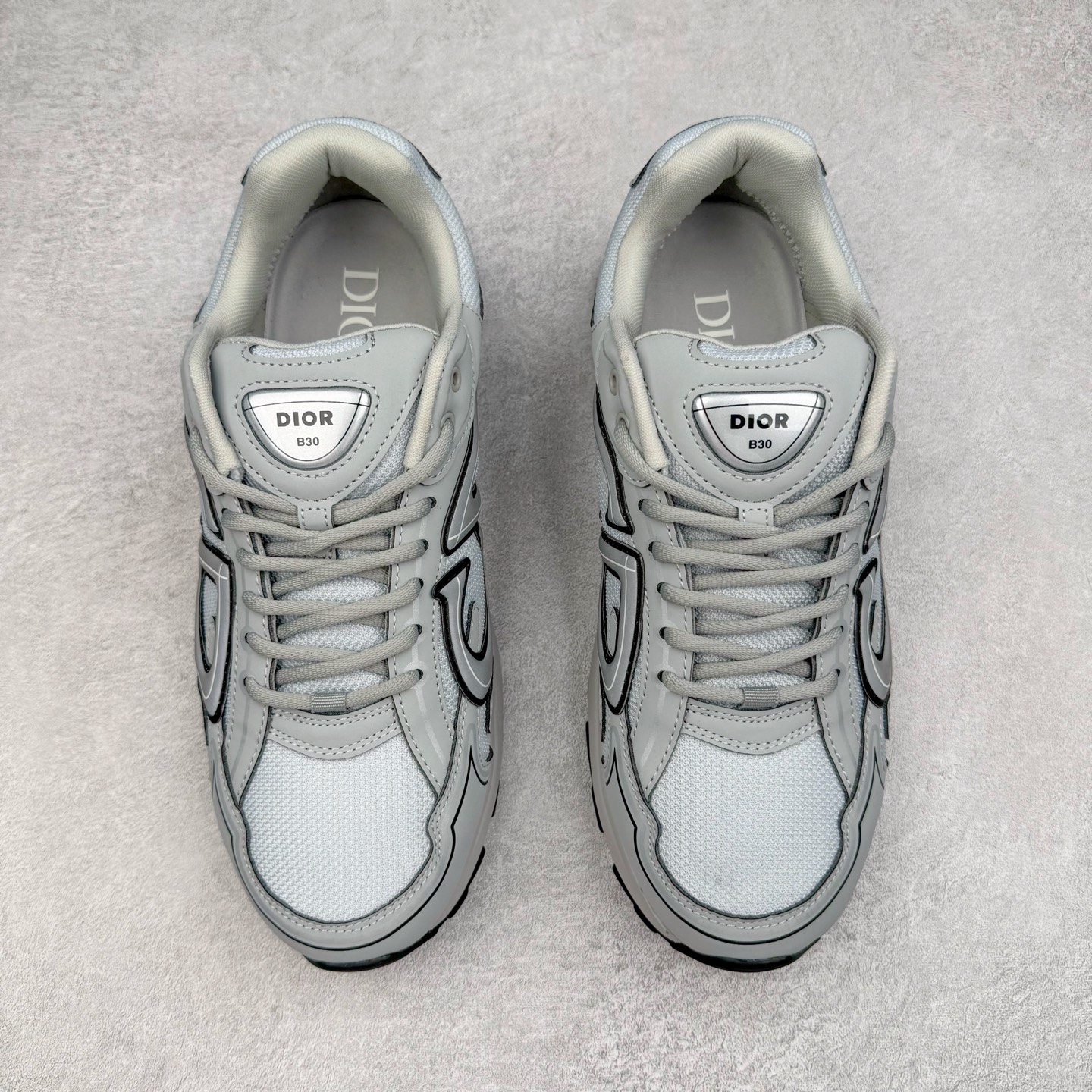 图片[2]-＃ZC总裁 Dior B30 迪奥网眼织物低帮运动休闲鞋 原版开模 海淘专供品质同渠道货源 全套专柜原装配件 该款系列采用黑网色眼织物白和色科技料面精心制 作饰以反光“CD30”图形标志 外格轻盈的刻雕效果橡胶鞋搭底配标志性点的缀提升格调 内弹部力细节塑造想理的舒适穿着体验可与各休式闲造型配搭 彰显尚时现代的运风动范 正常尺码：39 40 41 42 43 44 45-选品中心