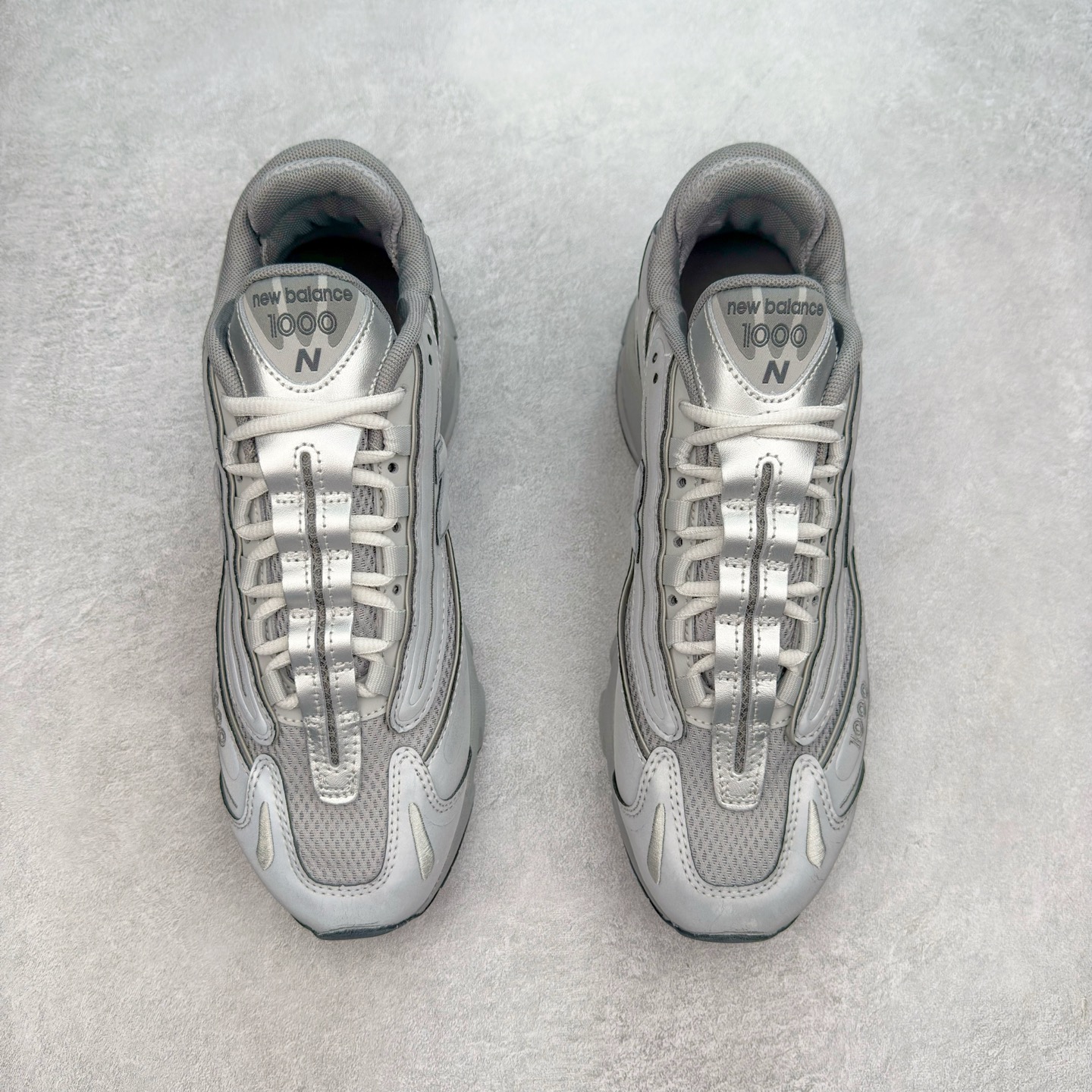 图片[2]-New Balance M1000 NB系列低帮复古老爹风休闲运动慢跑鞋 据悉，New Balance的复古鞋型M1000系列将在2024年正式回归。而自家美产创意总监Teddy Santis的AIMÉ LEON DORE也将率先推出联名1000撑撑场子，鞋款预计将在今年正式发布。New Balance1000系列作为NB最高端的鞋型，诞生于1999年，一度成为当年的热门鞋型，神似Nike Air Max95，现在看来也是一双符合潮流趋势的复古老爹鞋型。此番Teddy Santis亲自操刀，将丰富的配色和升级材质于复古的1000鞋型结合，鞋身采用米色、绿色和粉色的搭配。\\\”N\\\”字Logo也以全新的设计呈现，以1000标志性的网布和皮革材质打造，带来全新的视觉体验。后续ALD和New Balance1000的联名还将推出纯白配色，具体颜值还要等更多实物图的释出。AIMÉ LEON DORE和New Balance的多次联名一直有着超高的人气，无论是550还是1906R都有着不低的溢价，预计此番颜值不错的全新1000也会有着较高的人气。尺码：36 37 37.5 38 38.5 39.5 40 40.5 41.5 42 42.5 43 44 44.5 45-选品中心