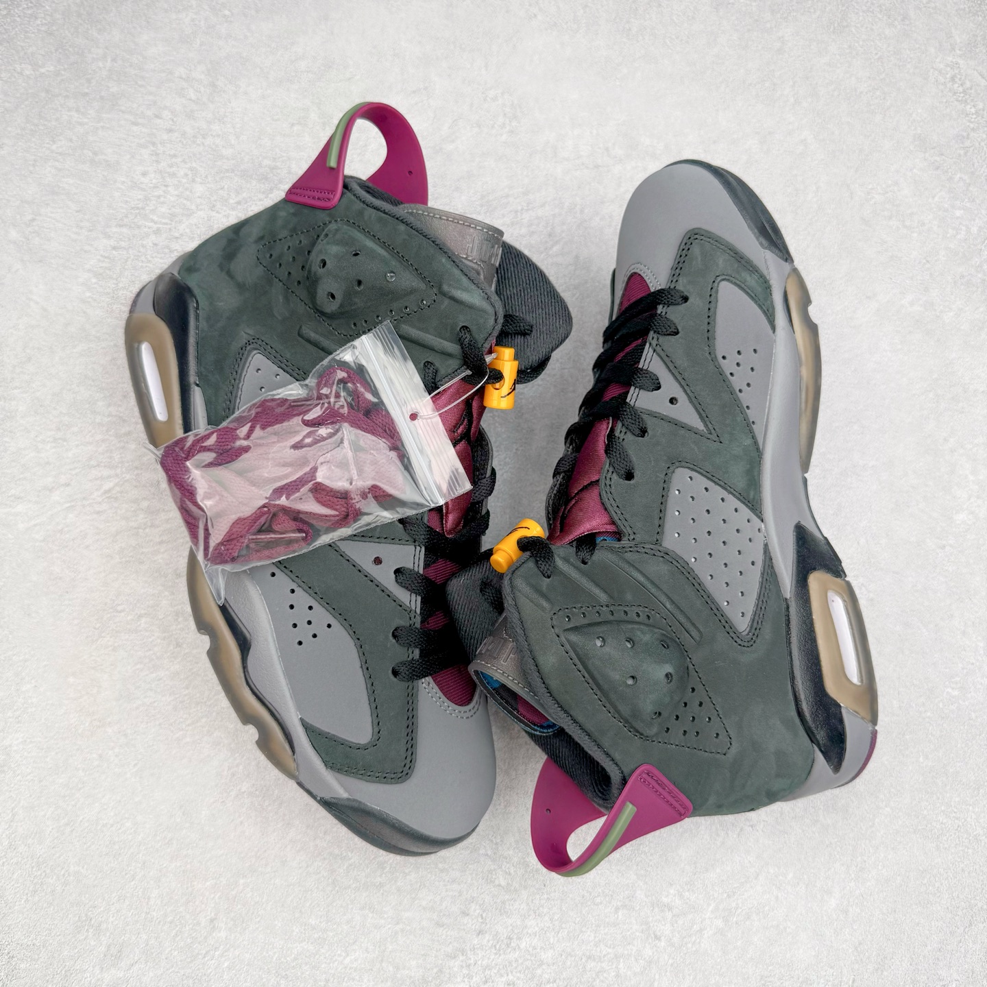 图片[3]-＃K版纯原 Air Jordan AJ6 Retro \\\”bordeaux\\\” 灰黑紫 CT8529-063 原楦原纸板开发 采购原厂皮料 原厂定型 后跟完美效果 到手可放心比对发售原鞋 上脚百分百充当正品驾驭 真正原装公司级完美鞋型 一切细节实拍所见所得 纸板中底、钢印 完美版型 一应俱全外贸专供 发国外寄售可稳妥充正操作 实拍调校N版已经零色差零失真 百分百还原实物色彩所见即所得 不存在货不对板色差等低级问题 选购参考实物拍摄 不混卖不参货 只用心做好货严格选品 承诺混一赔十 尺码：40 40.5 41 42 42.5 43 44 44.5 45 46 47.5-选品中心
