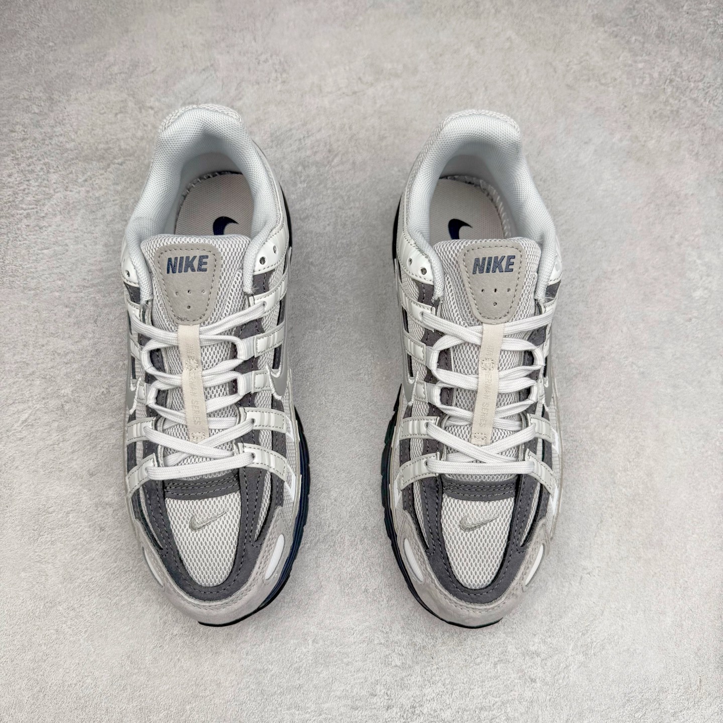 图片[2]-NK P-6000 系列低帮复古老爹风休闲运动舒适慢跑鞋 IB3081-001 融合 Pegasus 过往运动鞋设计 助力 21 世纪早期跑步运动跃升时尚新高度 采用透气网眼布、运动风格线条和耐穿覆面 兼具吸睛外观和舒适感受 中底泡绵以田径赛道为灵感 打造厚实设计 缔造出众缓震性能 尺码：36 36.5 37.5 38 38.5 39 40 40.5 41 42 42.5 43 44 44.5 45-选品中心