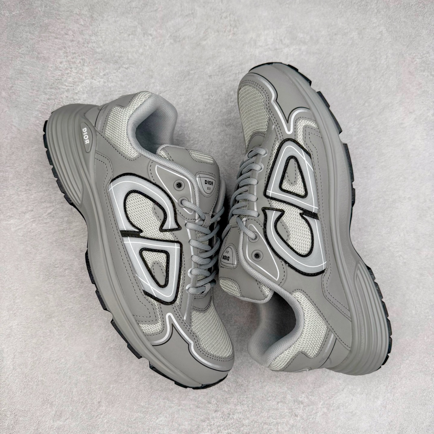 图片[3]-＃福利特价 Dior B30 迪奥网眼织物低帮运动休闲鞋 该款系列采用黑网色眼织物白和色科技料面精心制 作饰以反光“CD30”图形标志 外格轻盈的刻雕效果橡胶鞋搭底配标志性点的缀提升格调 内弹部力细节塑造想理的舒适穿着体验可与各休式闲造型配搭 彰显尚时现代的运风动范 尺码：36 37 35 39 40 41 42 43 44 45-选品中心