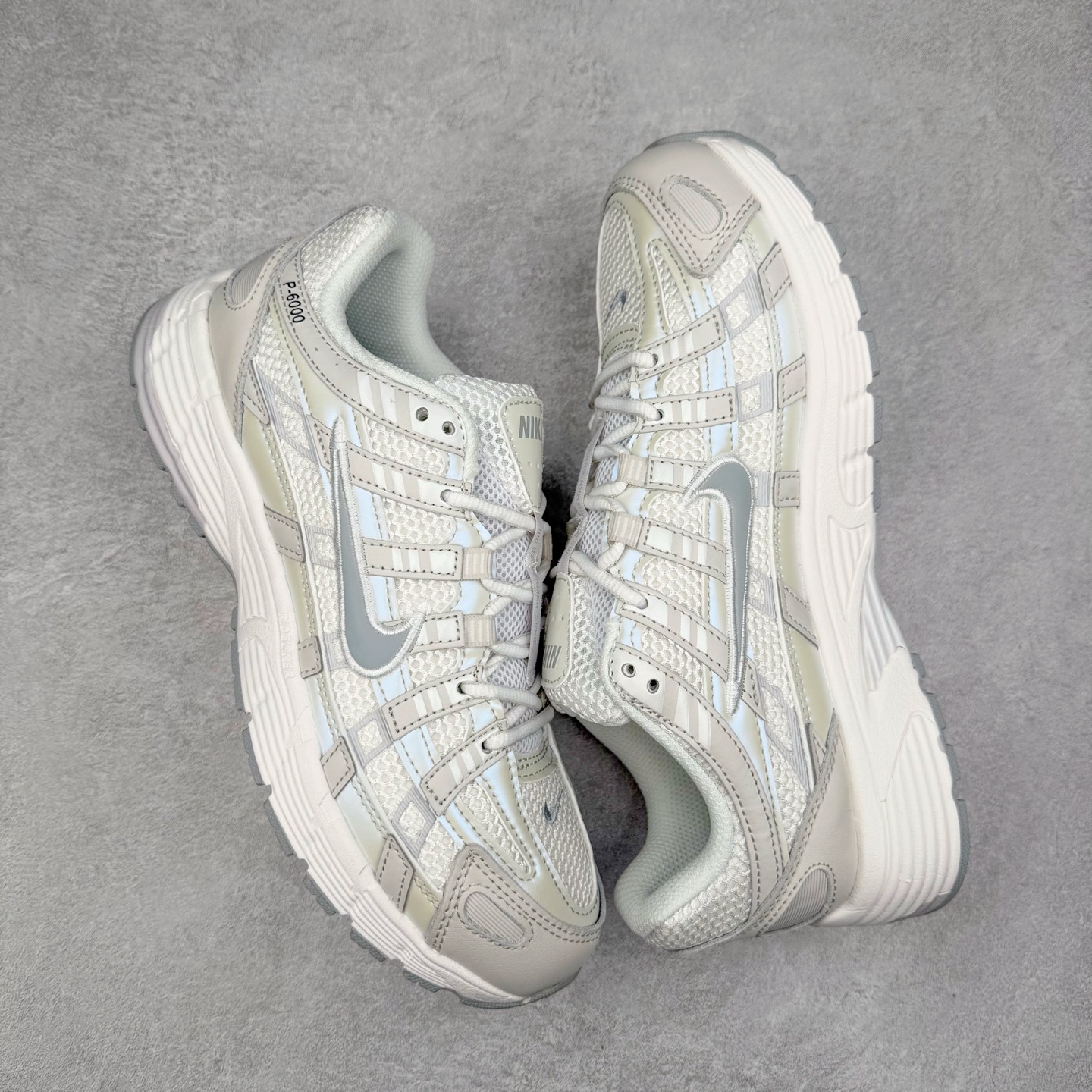 图片[3]-NK P-6000 系列低帮复古老爹风休闲运动舒适慢跑鞋 IF1756-100 融合 Pegasus 过往运动鞋设计 助力 21 世纪早期跑步运动跃升时尚新高度 采用透气网眼布、运动风格线条和耐穿覆面 兼具吸睛外观和舒适感受 中底泡绵以田径赛道为灵感 打造厚实设计 缔造出众缓震性能 尺码：36 36.5 37.5 38 38.5 39 40 40.5 41 42 42.5 43 44 44.5 45-选品中心